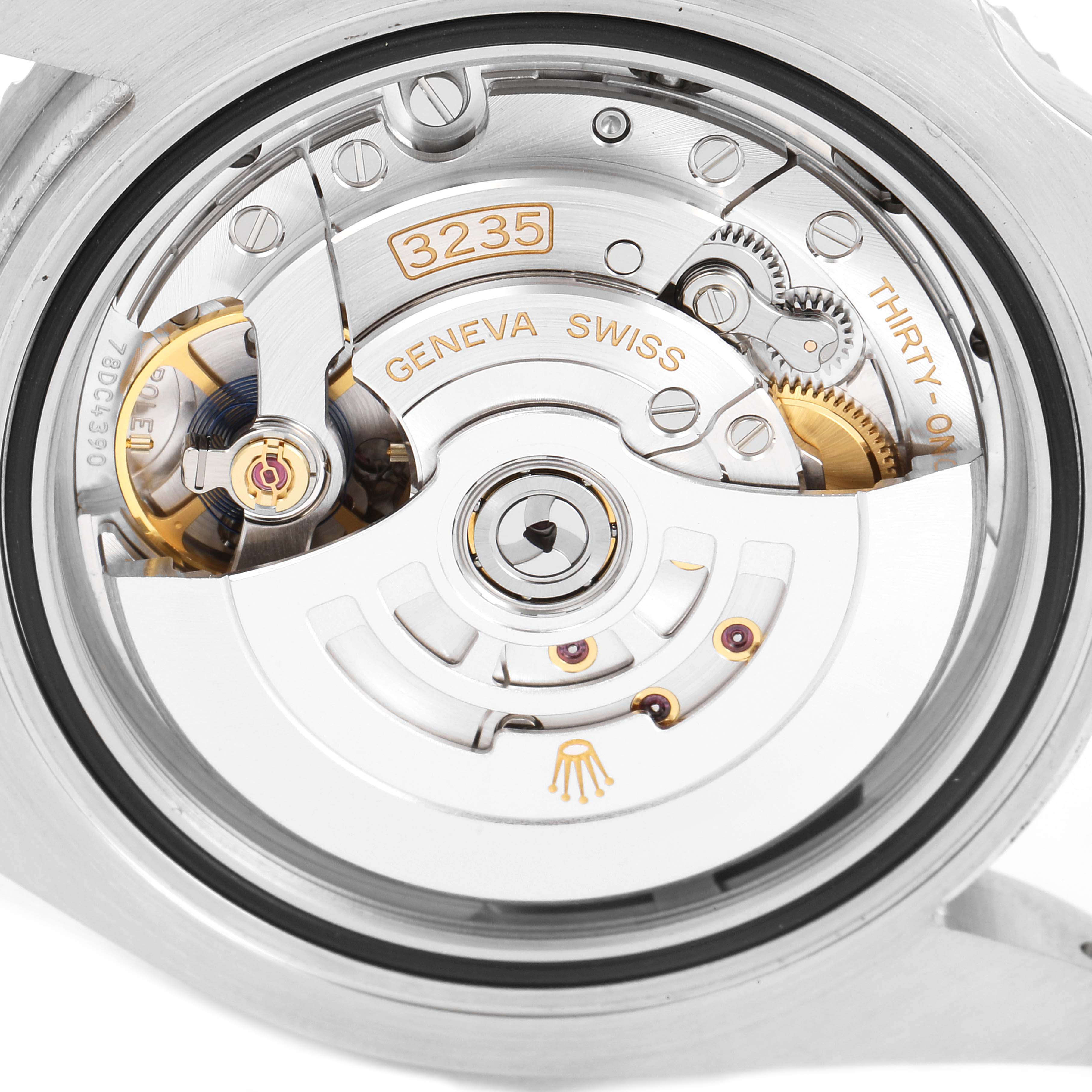 This image shows the backside view of a Rolex Submariner 126610LN Men
s Stainless Steel Black Dial 126610LN Men
s Stainless Steel Black Dial, focusing on its Caliber 3235 automatic movement.