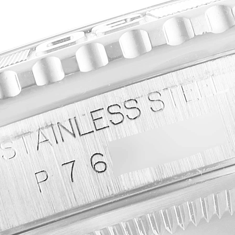 The image shows a close-up view of the side of a Rolex Turn-o-Graph 16264 Men
s Stainless Steel Silver Dial 16264 Men
s Stainless Steel Silver Dial
s case and bezel, highlighting the "Stainless Steel" engraving.