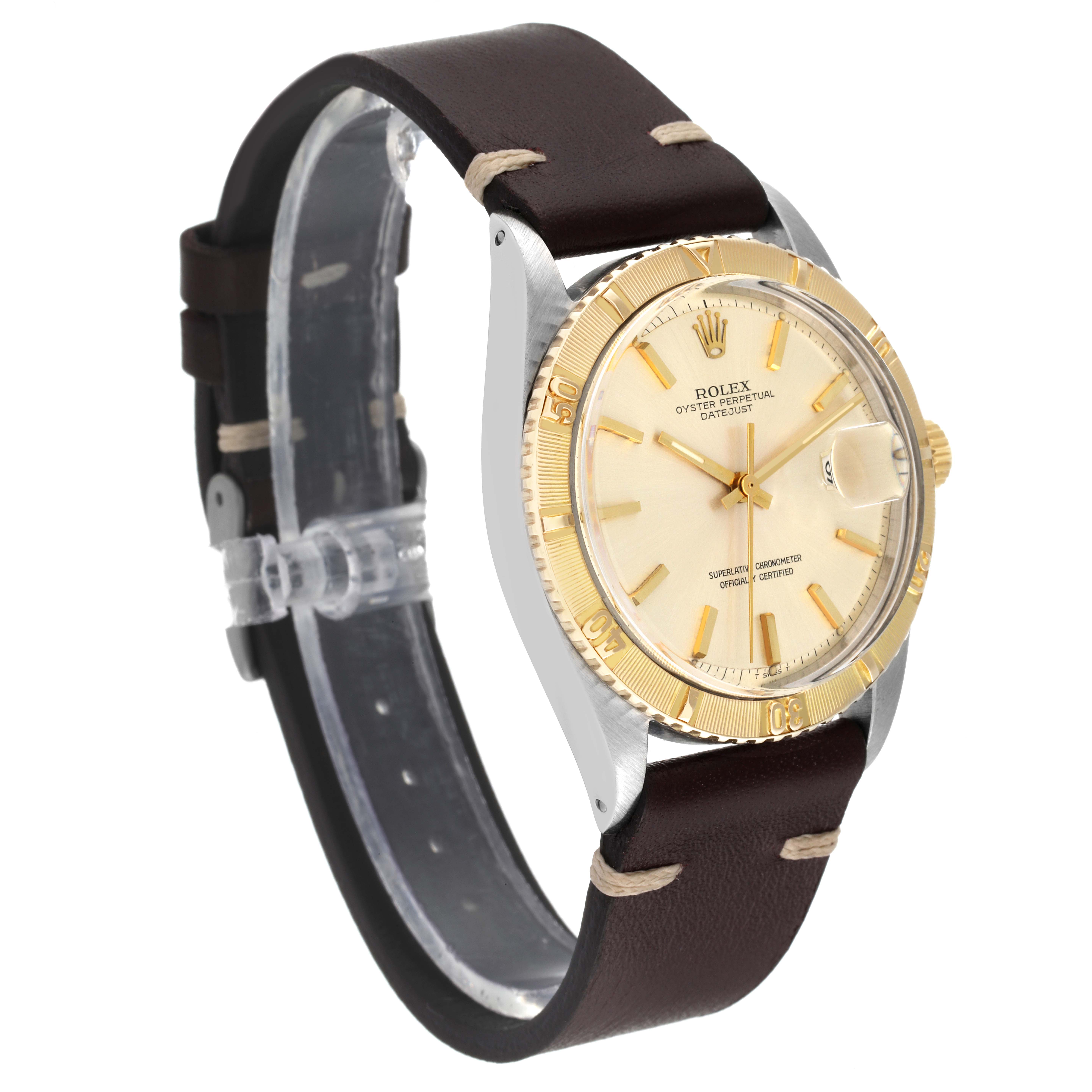 The Rolex Vintage Collection 1625 Men's Steel and Gold (two tone) Silver Dial 1625 Men's Steel and Gold (two tone) Silver Dial model is shown at a slight angle, highlighting its gold bezel, cream dial, and brown leather strap.