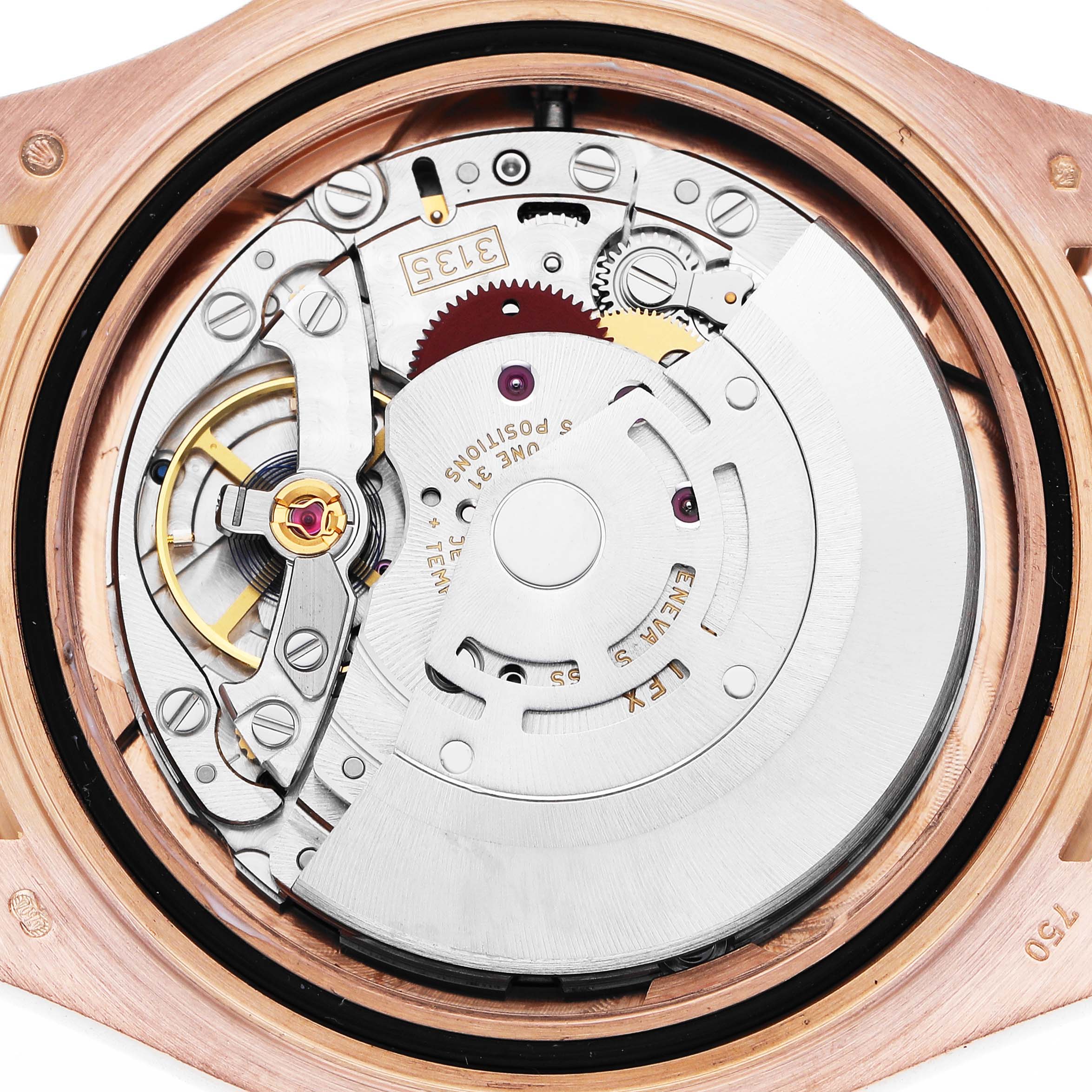 The image shows the movement and back view of a Rolex Yacht-Master 116655 Men's Rose Gold Black Dial watch, highlighting its intricate internal mechanics.