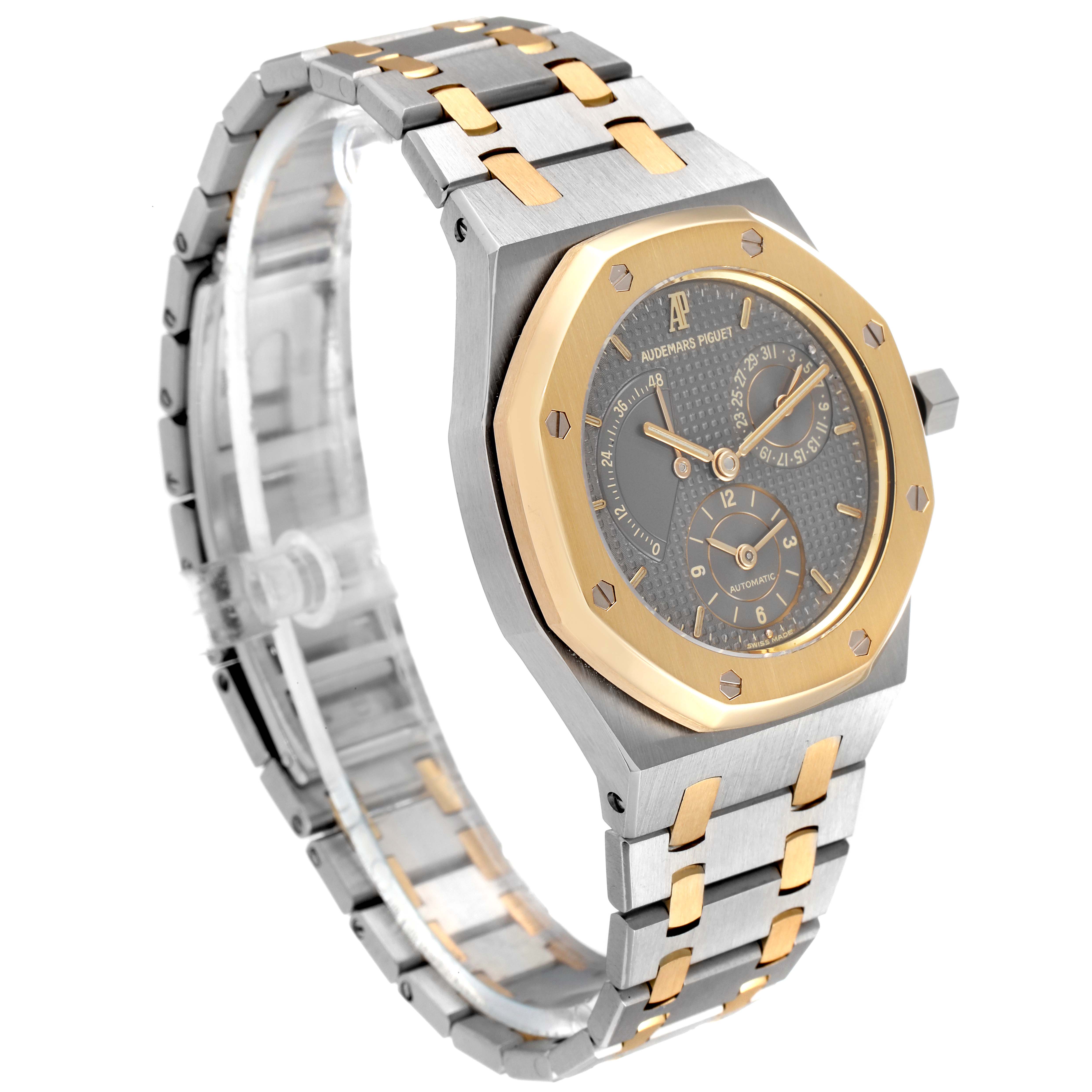 The image shows a side and angled view of an Audemars Piguet Royal Oak 25730SA.01.078 Men
s Steel and Gold (two tone) Silver Dial 25730SA.01.078 Men
s Steel and Gold (two tone) Silver Dial watch, featuring a two-tone case and bracelet.