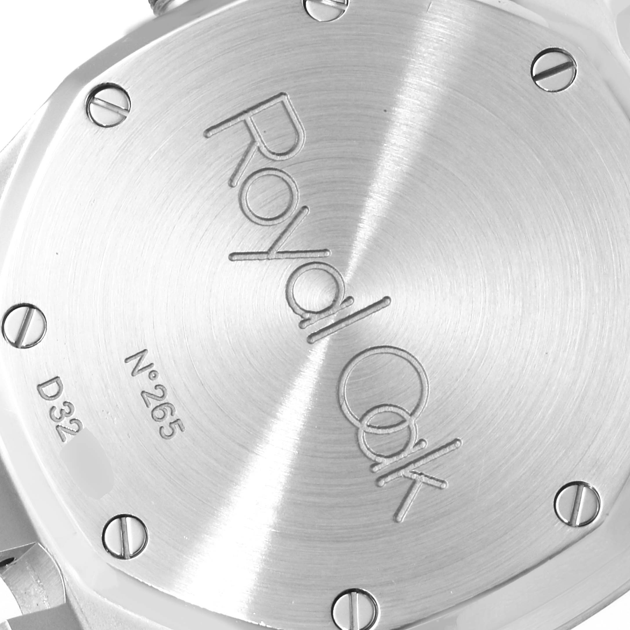 This image shows the back case of an Audemars Piguet Royal Oak 25730SA.01.078 Men
s Steel and Gold (two tone) Silver Dial 25730SA.01.078 Men
s Steel and Gold (two tone) Silver Dial watch, highlighting the engraved logo and screw details.