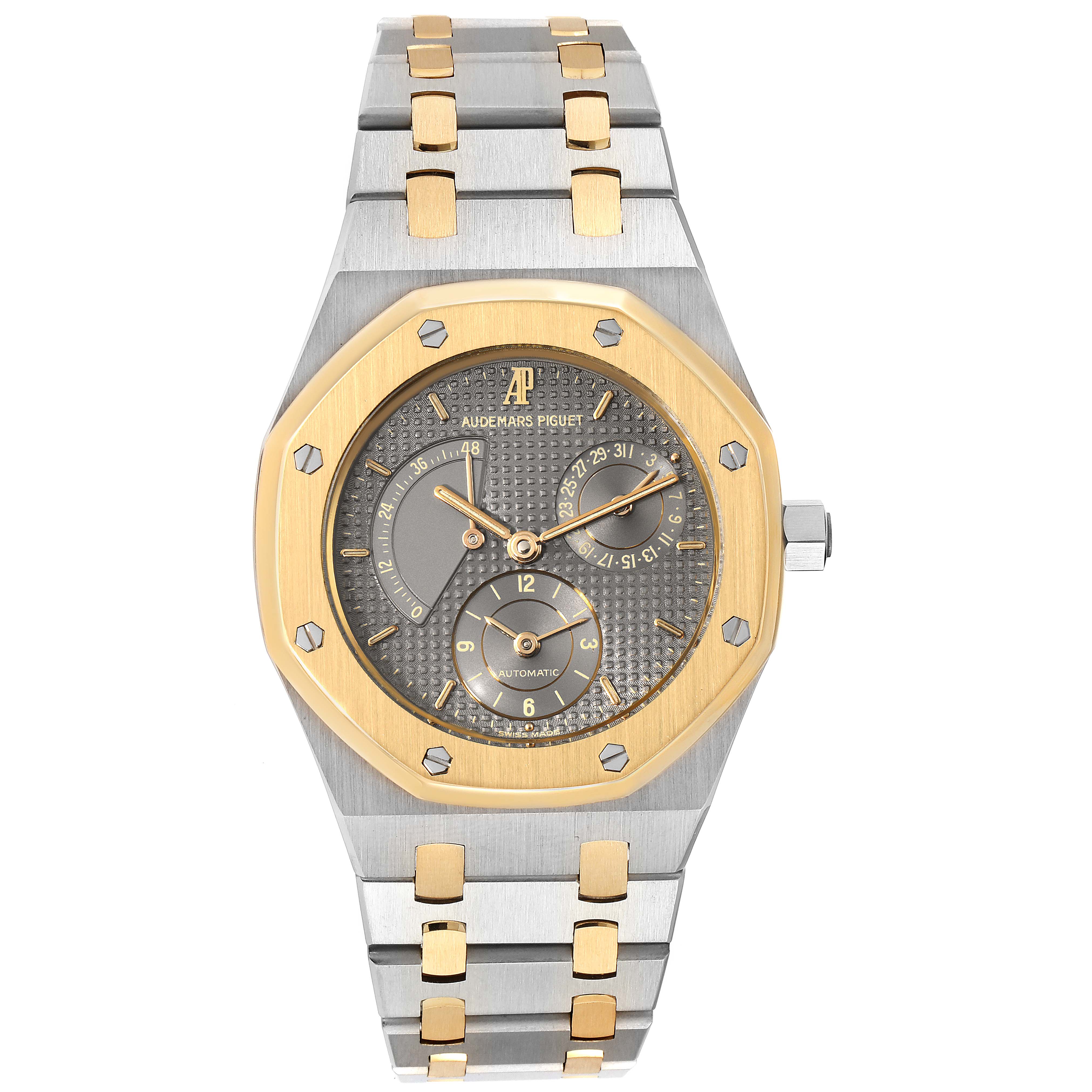 The image shows a front view of an Audemars Piguet Royal Oak 25730SA.01.078 Men
s Steel and Gold (two tone) Silver Dial 25730SA.01.078 Men
s Steel and Gold (two tone) Silver Dial watch featuring a two-tone metal strap and octagonal bezel.