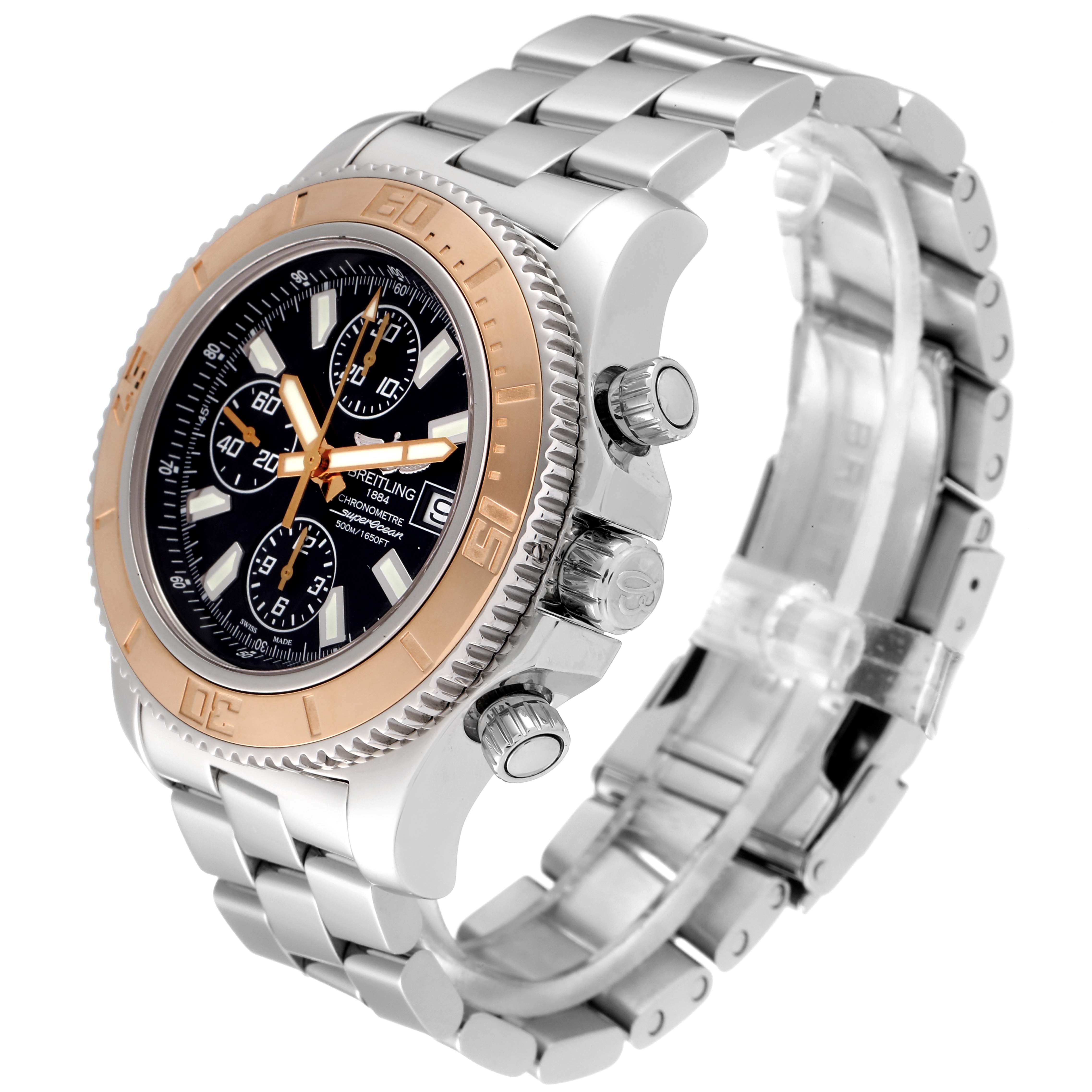 The Breitling Superocean C13341 Men's Steel and Gold (two tone) Black Dial C13341 Men's Steel and Gold (two tone) Black Dial watch is shown at a three-quarter angle, focusing on the face, bezel, and stainless steel bracelet.
