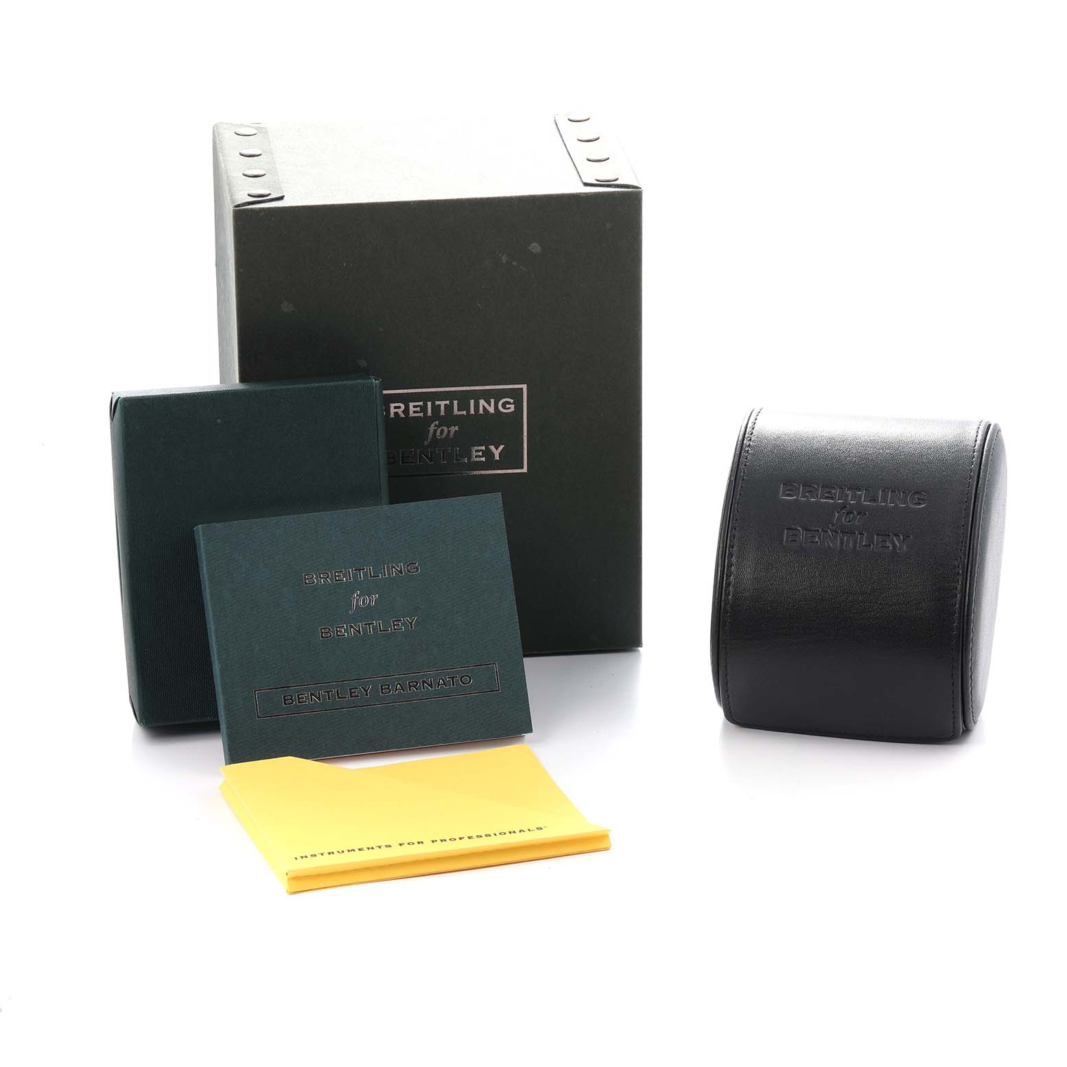 The image displays a top view of the Breitling for Bentley watch box, documentation, and leather case.