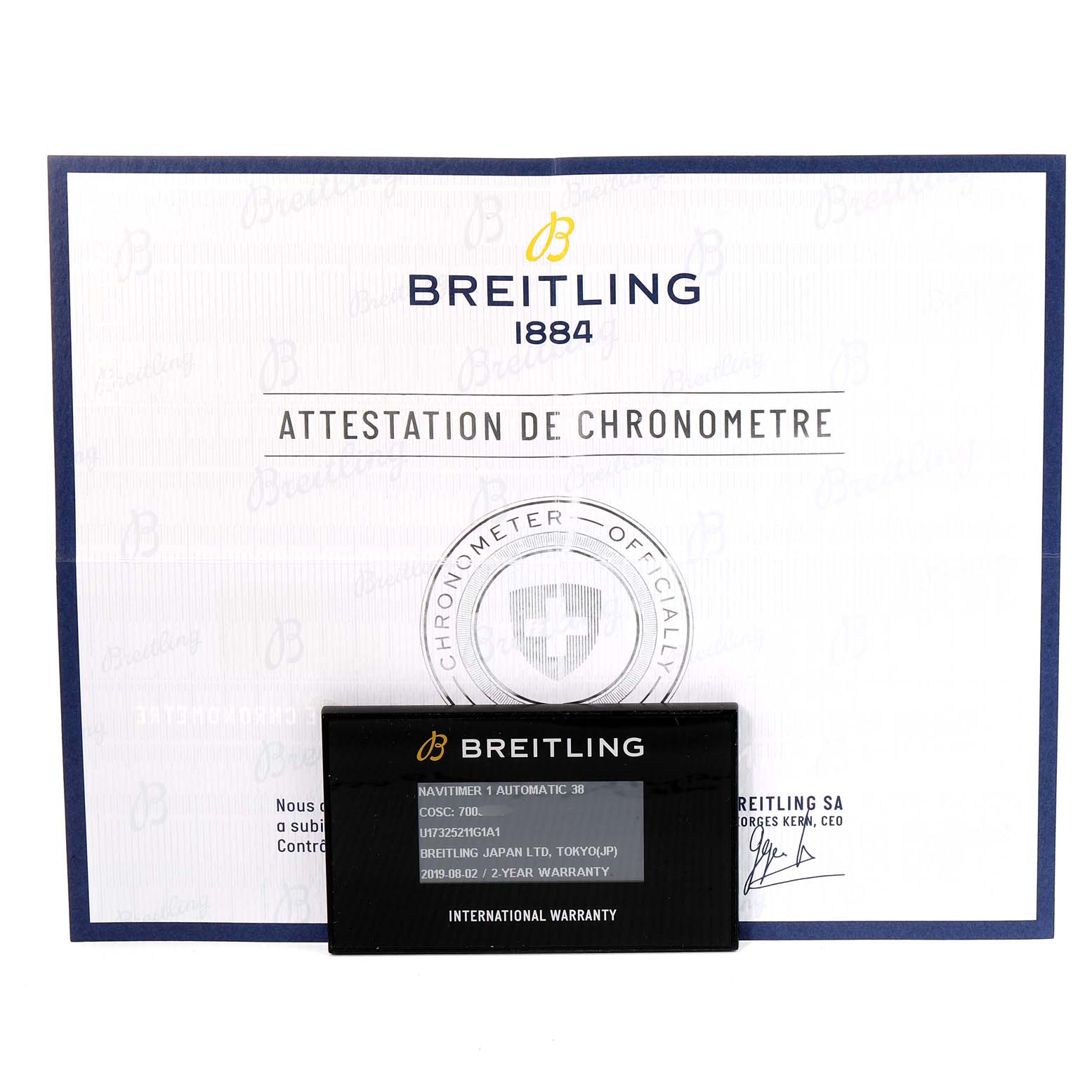 The image shows an international warranty card and attestation certificate for a Breitling Navitimer U17325211G1A1 Men's Stainless Steel Silver Dial U17325211G1A1 Men's Stainless Steel Silver Dial model.