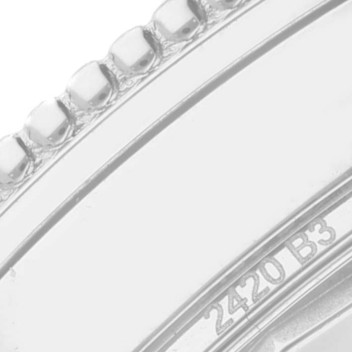 This close-up angle shows the bezel and part of the case of the Breitling Navitimer A17326 Men's Stainless Steel Black Dial A17326 Men's Stainless Steel Black Dial watch.