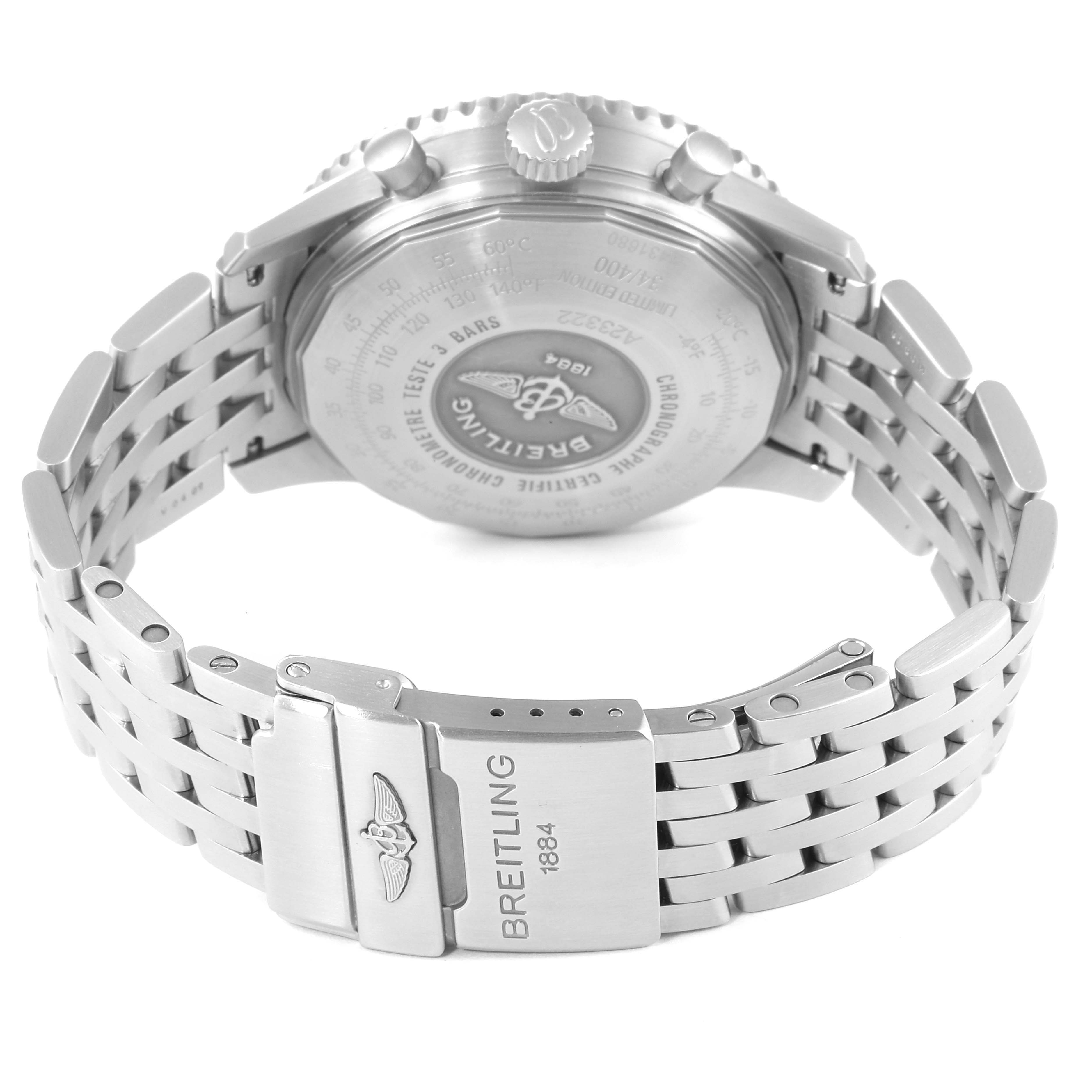 The image shows the back view of a Breitling Navitimer A23322 Men's Stainless Steel Silver Dial A23322 Men's Stainless Steel Silver Dial watch, including its clasp, bracelet, and engraved case back.