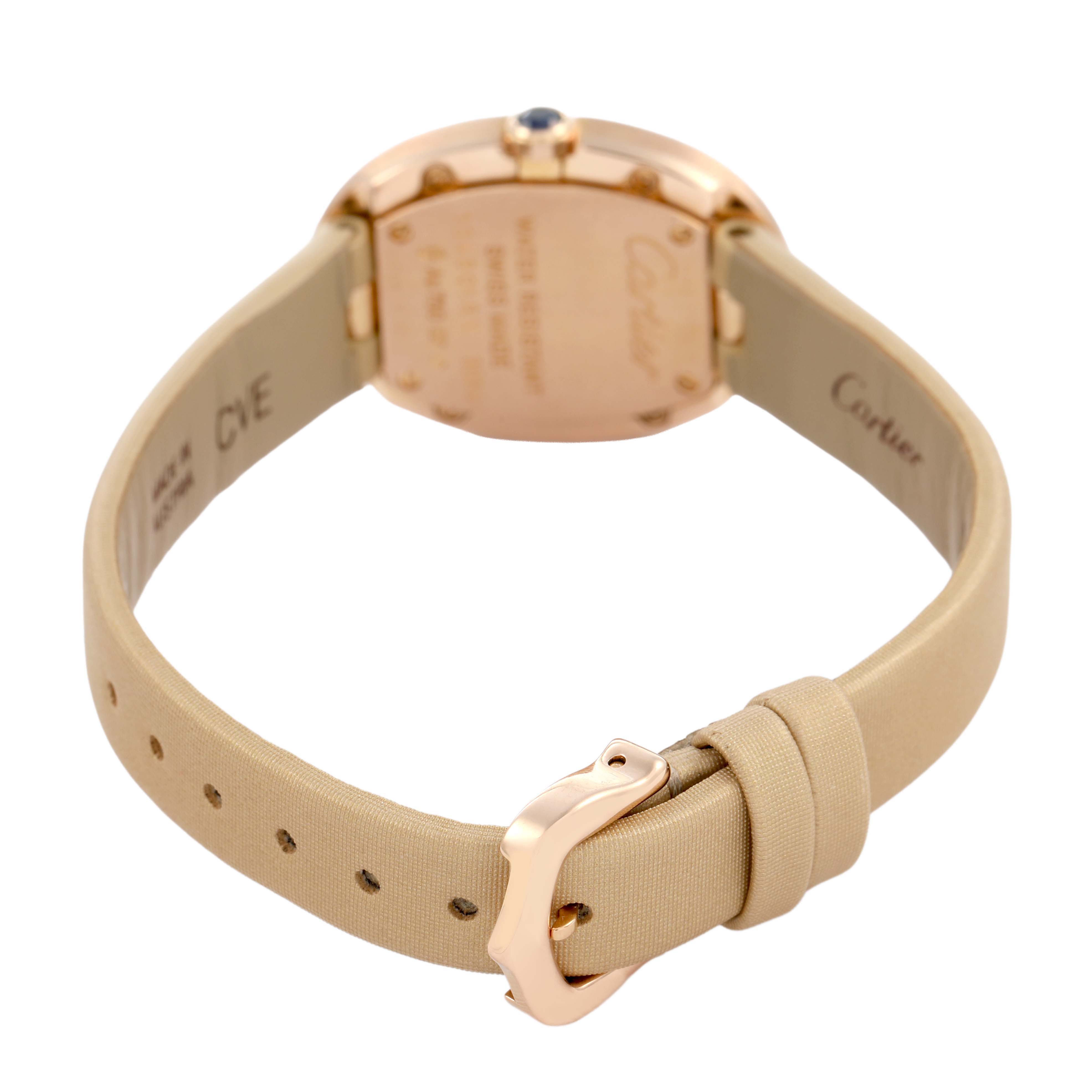The image shows the Baignoire model by Cartier from the back, focusing on the caseback, strap, and buckle.