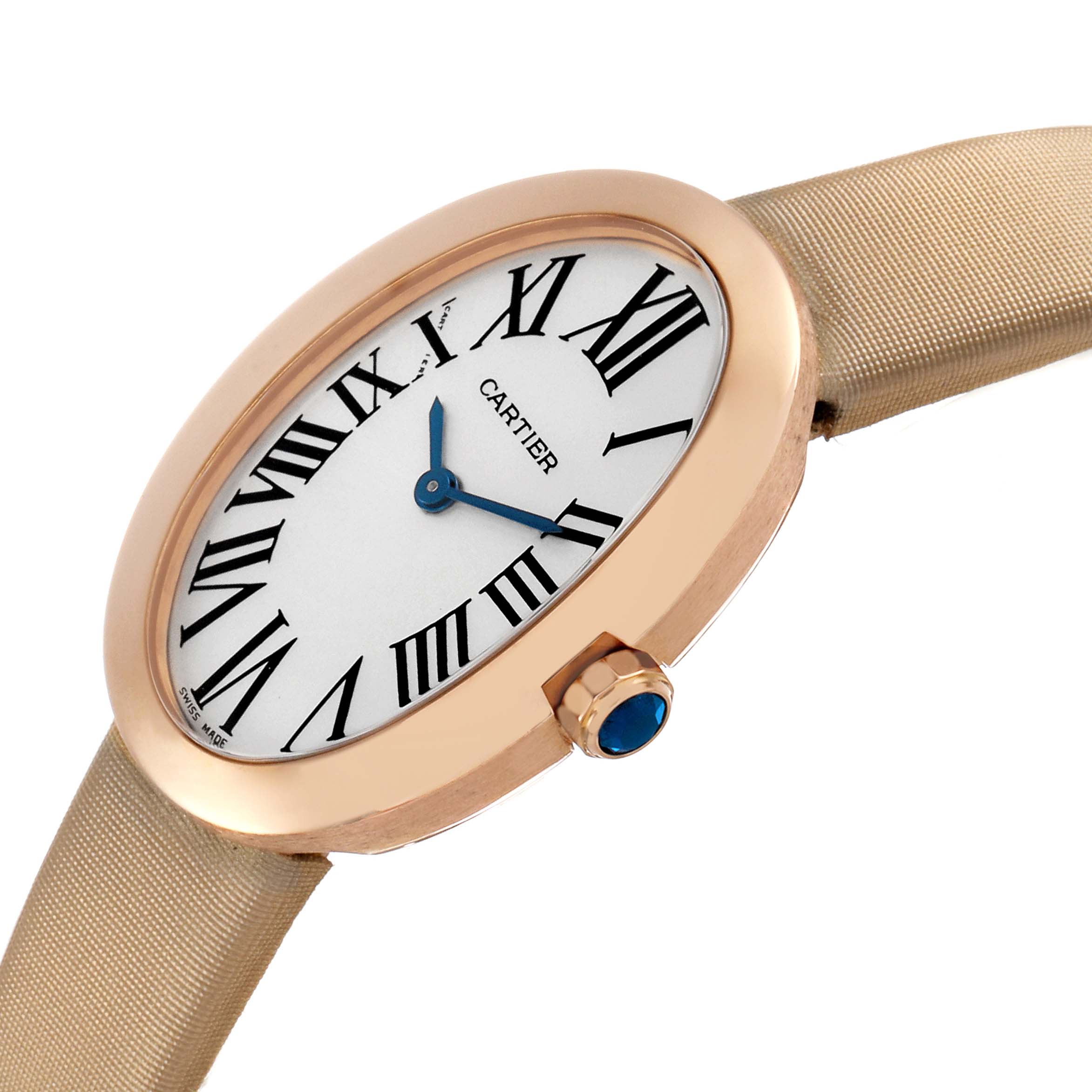 The Cartier Baignoire W8000007 Women's Yellow Gold Silver Dial watch is shown at an angled side view, highlighting its oval face, Roman numerals, and crown with a blue cabochon.