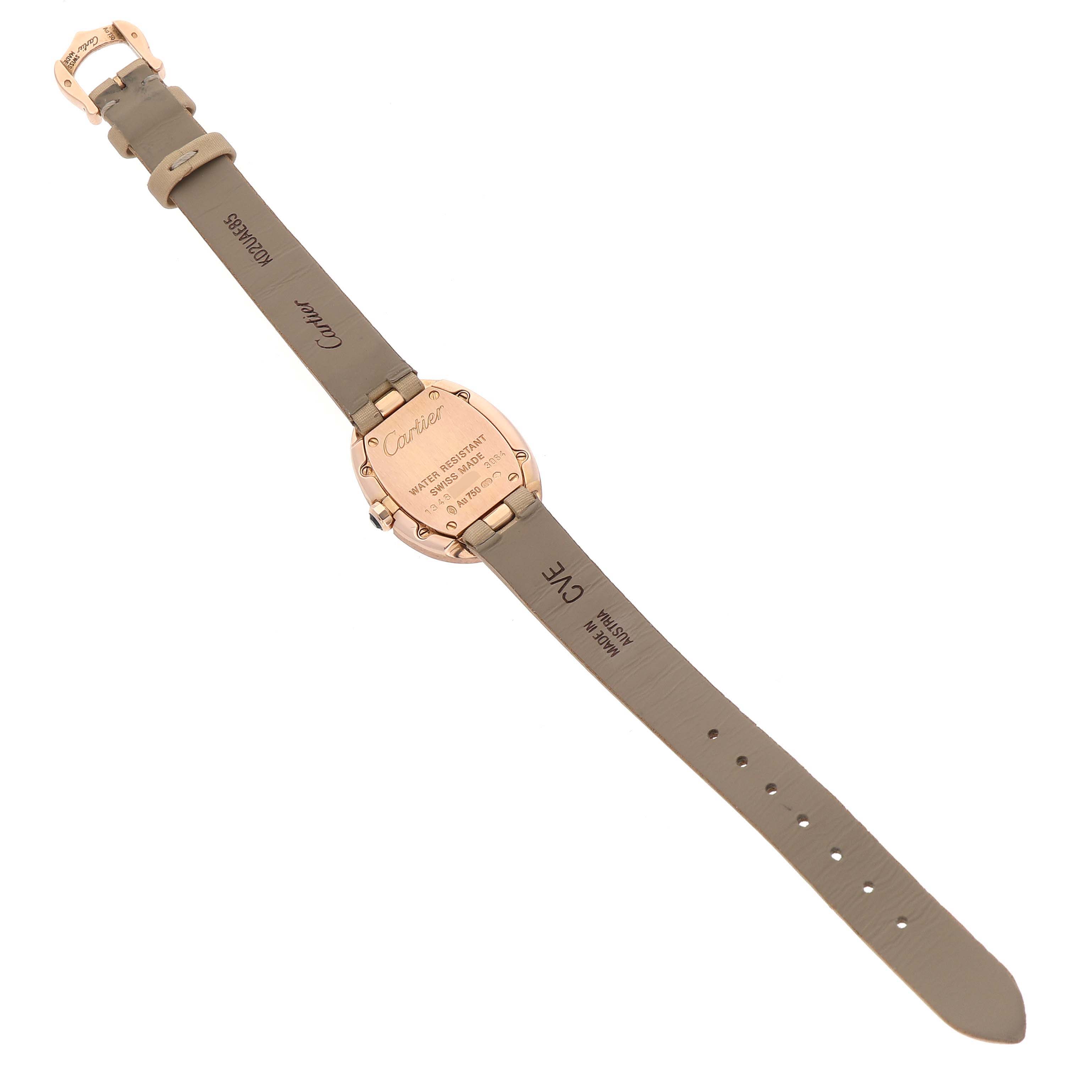 The image shows the back view of a Cartier Baignoire W8000007 Women's Yellow Gold Silver Dial watch, highlighting its case back and leather strap.
