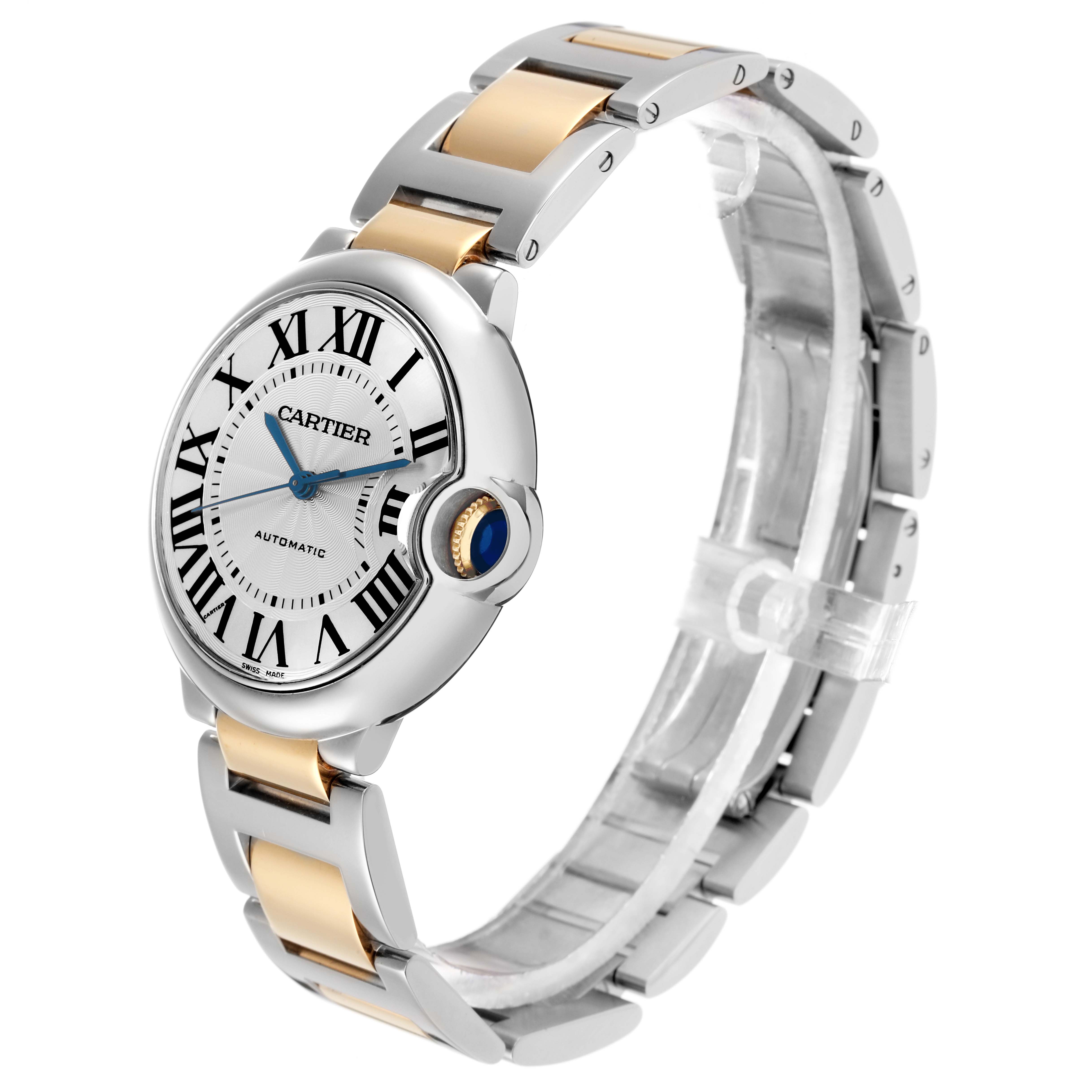 The Cartier Ballon Bleu W2BB0012 Men
s Steel and Gold (two tone) Silver Dial watch is shown at a slight angle, highlighting its face, crown, and two-tone metal bracelet.