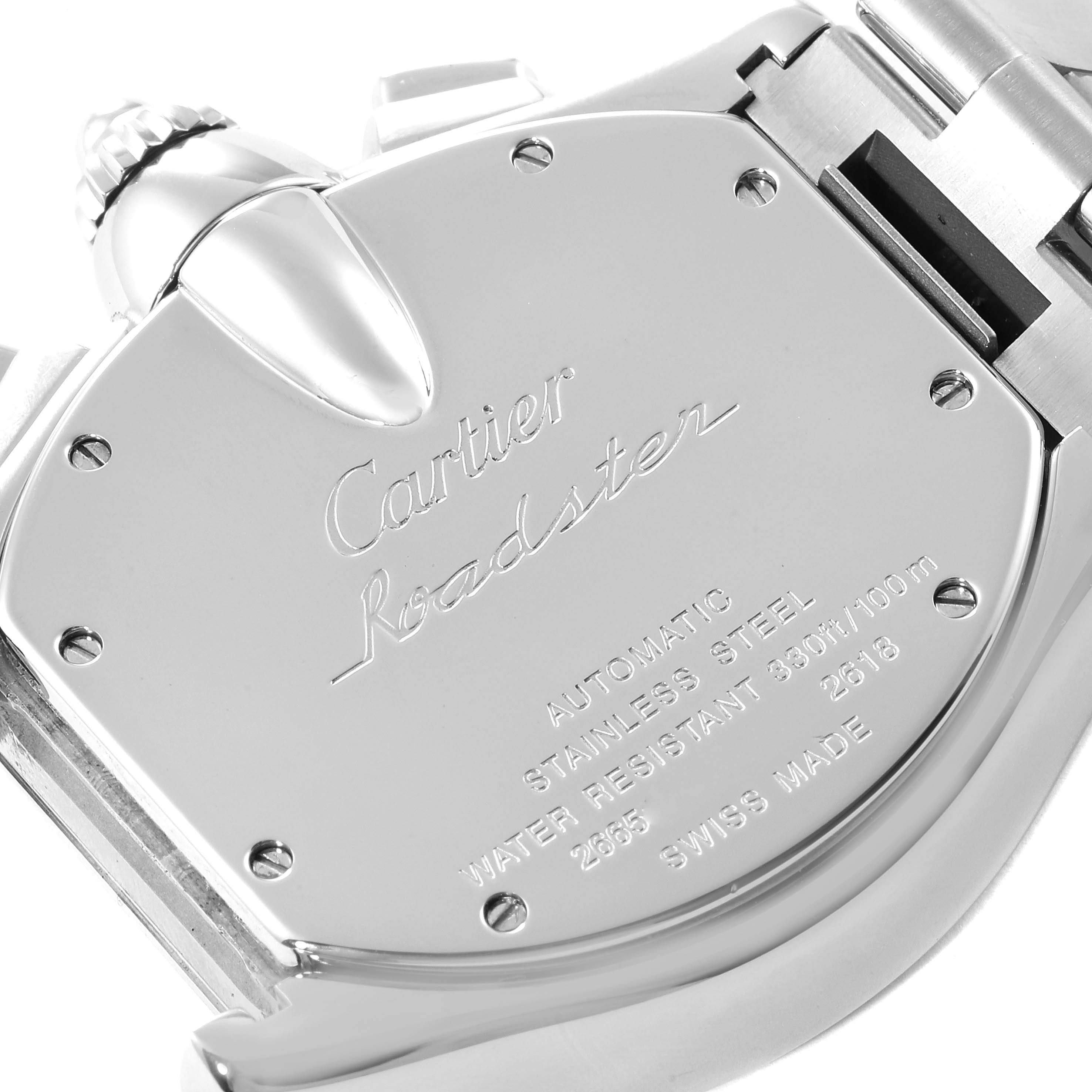 The image shows the stainless steel case back of a Cartier Roadster W62019X6 Men's Stainless Steel Silver Dial W62019X6 Men's Stainless Steel Silver Dial watch, highlighting engraved details and the edge of the bracelet.