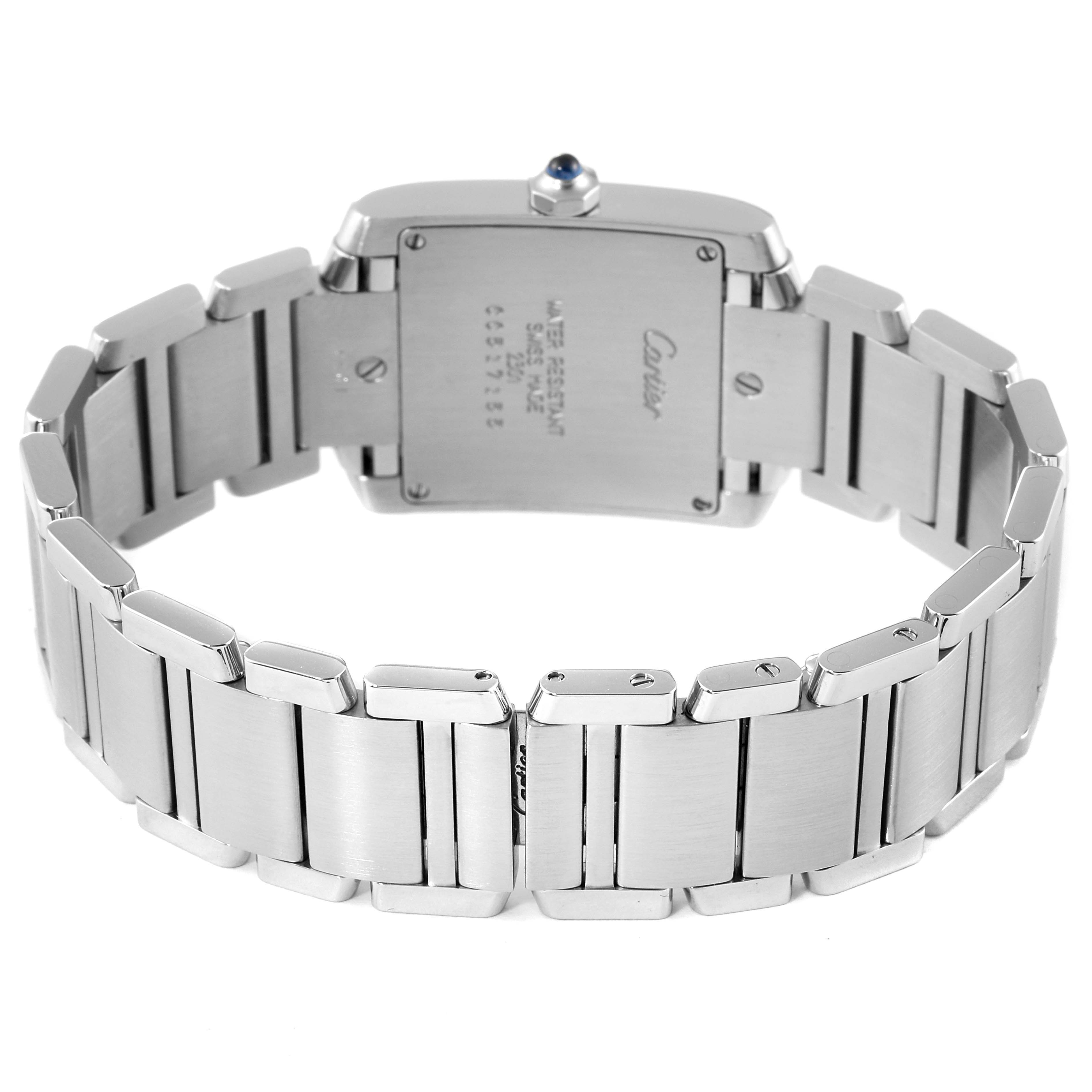 The image shows the back side of the Cartier Tank Francaise W51003Q3 Women's Stainless Steel Silver Dial W51003Q3 Women's Stainless Steel Silver Dial watch, focusing on the case back and metal bracelet.