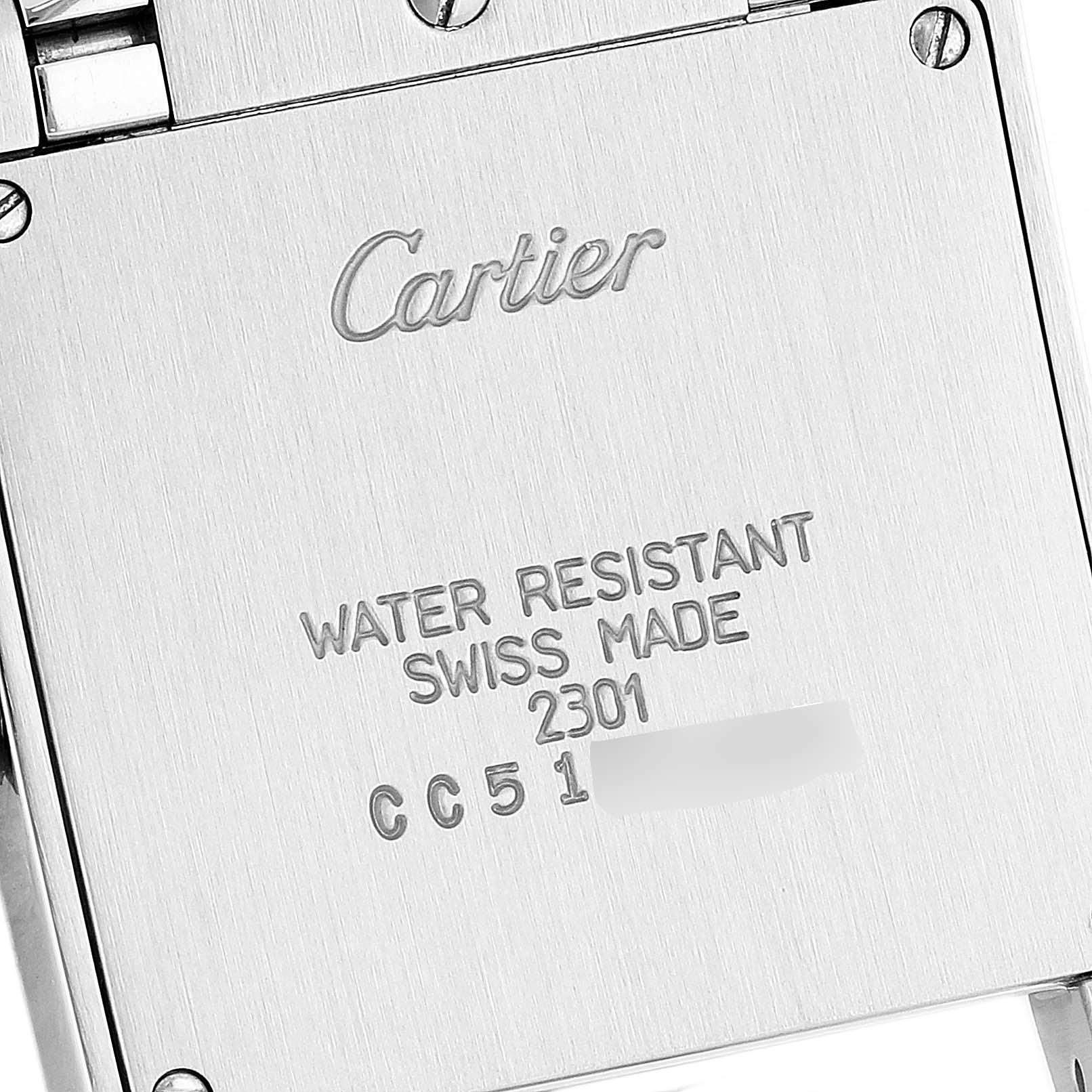 This image shows the back case of a Cartier Tank Francaise W51003Q3 Women's Stainless Steel Silver Dial W51003Q3 Women's Stainless Steel Silver Dial watch, highlighting its engravings and screws.