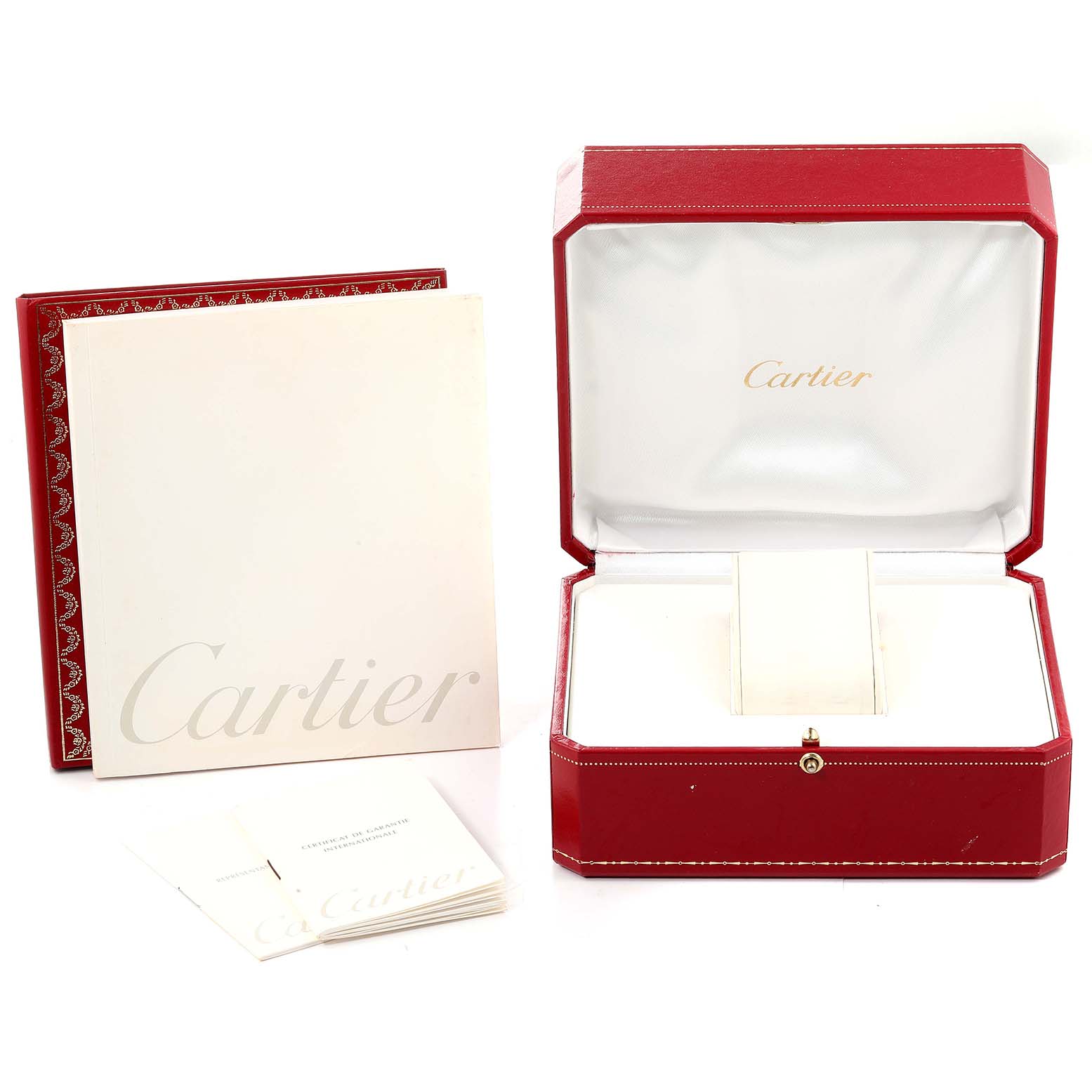 The image shows the packaging and documentation for a Cartier Tank Française watch, including the box and manuals.
