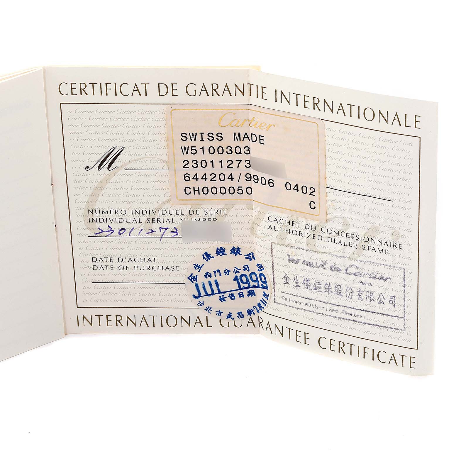 The image shows the International Guarantee Certificate for the Cartier Tank Francaise W51003Q3 Women's Stainless Steel Silver Dial W51003Q3 Women's Stainless Steel Silver Dial model, featuring serial numbers and an authorized dealer stamp.