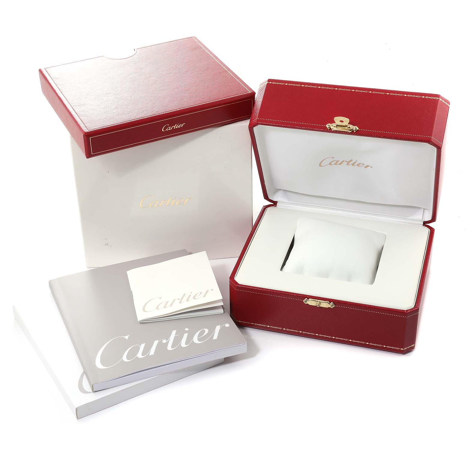 The image shows the packaging and accessories for a Cartier Tank Française watch, including a box, case, and booklets.