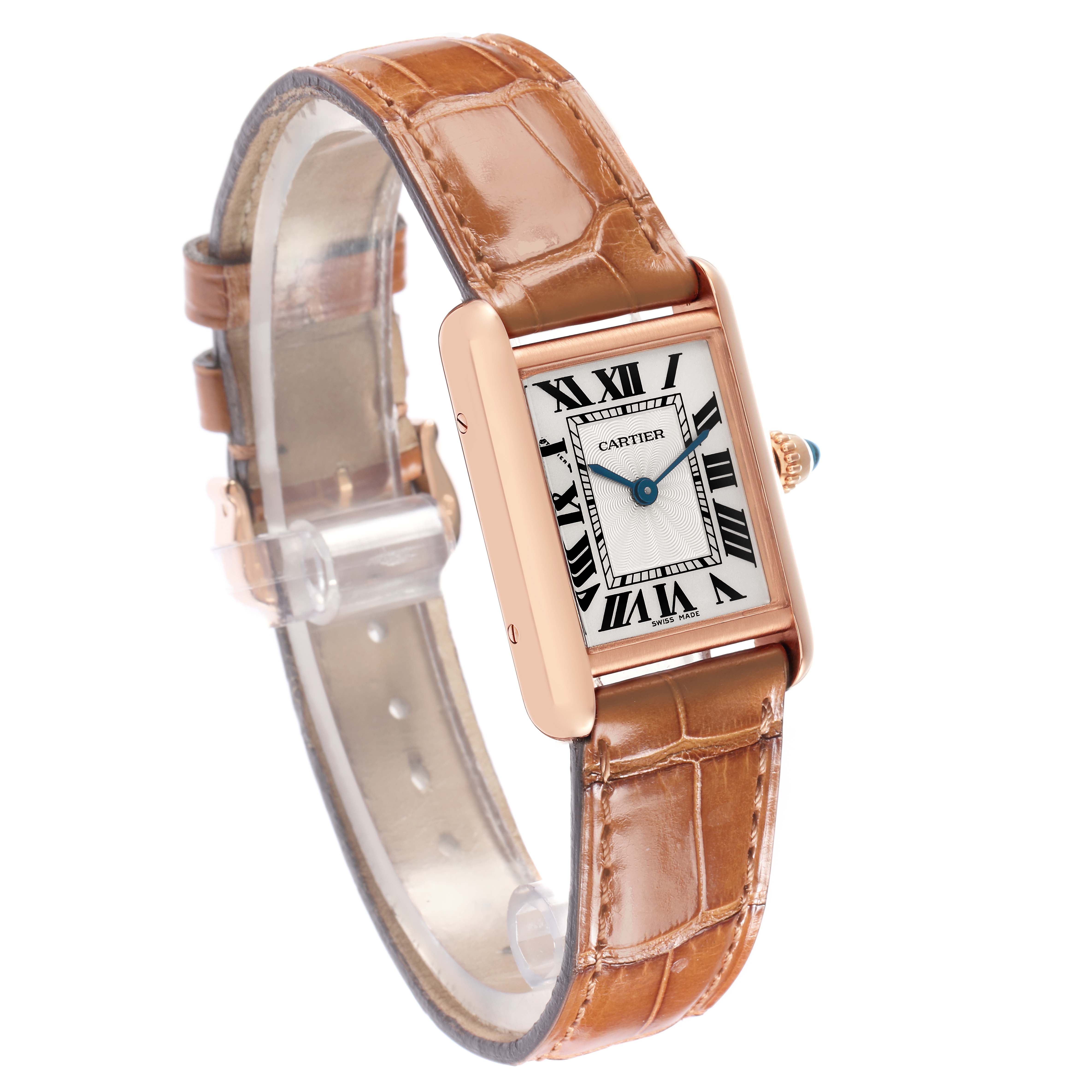 The Cartier Tank Louis WGTA0010 Women
s Rose Gold Silver Dial watch is shown at an angled side view, displaying the face, crown, and brown leather strap.