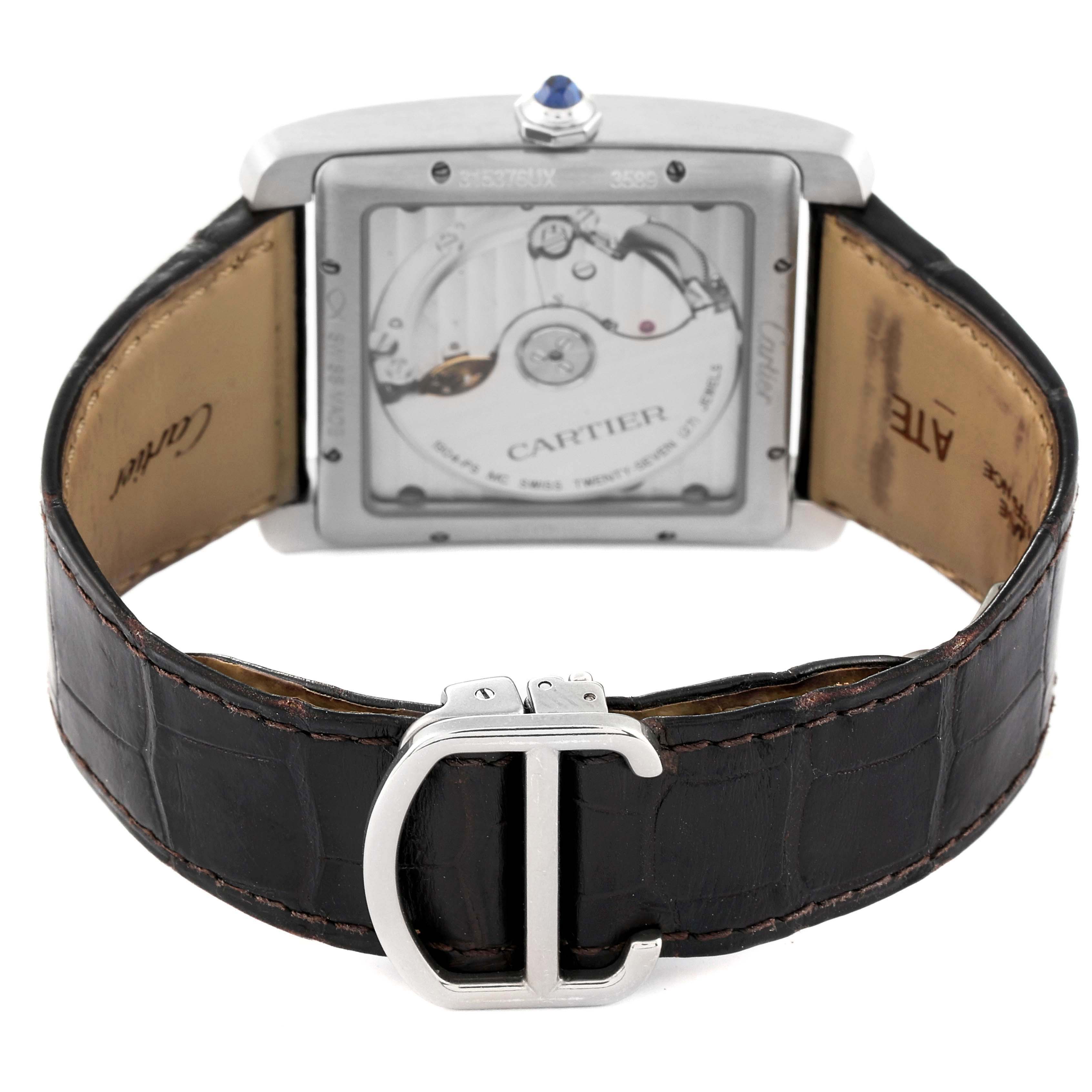 The image shows the back view of a Cartier Tank MC W5330003 Men
s Stainless Steel Silver Dial W5330003 Men
s Stainless Steel Silver Dial watch, displaying the case back, movement, and leather strap with buckle.