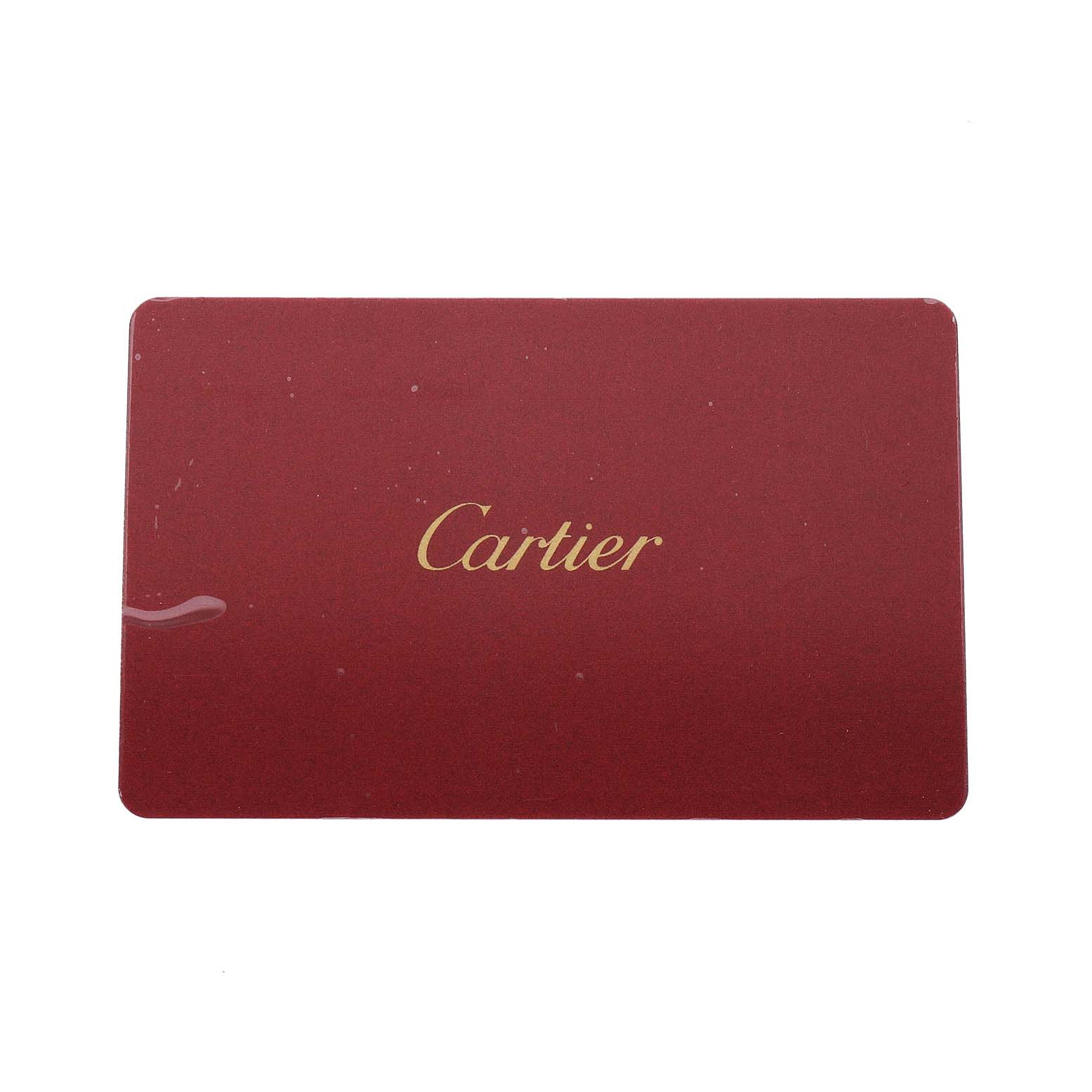 This image shows a red Cartier card, possibly an accessory for the Tank Solo watch model.