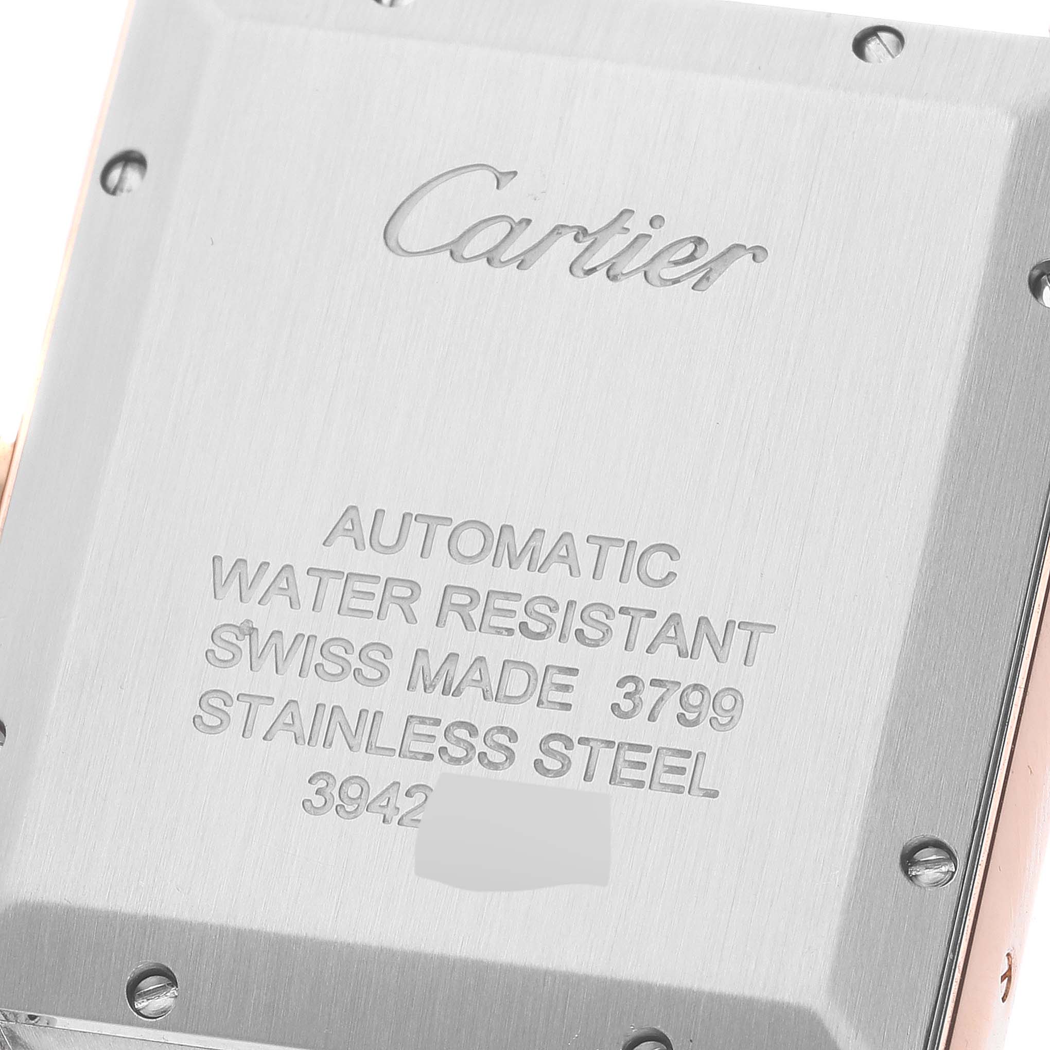 The image shows the back of a Cartier Tank Solo W5200026 Men's Steel and Gold (two tone) Silver Dial W5200026 Men's Steel and Gold (two tone) Silver Dial watch, highlighting inscriptions and detailing.