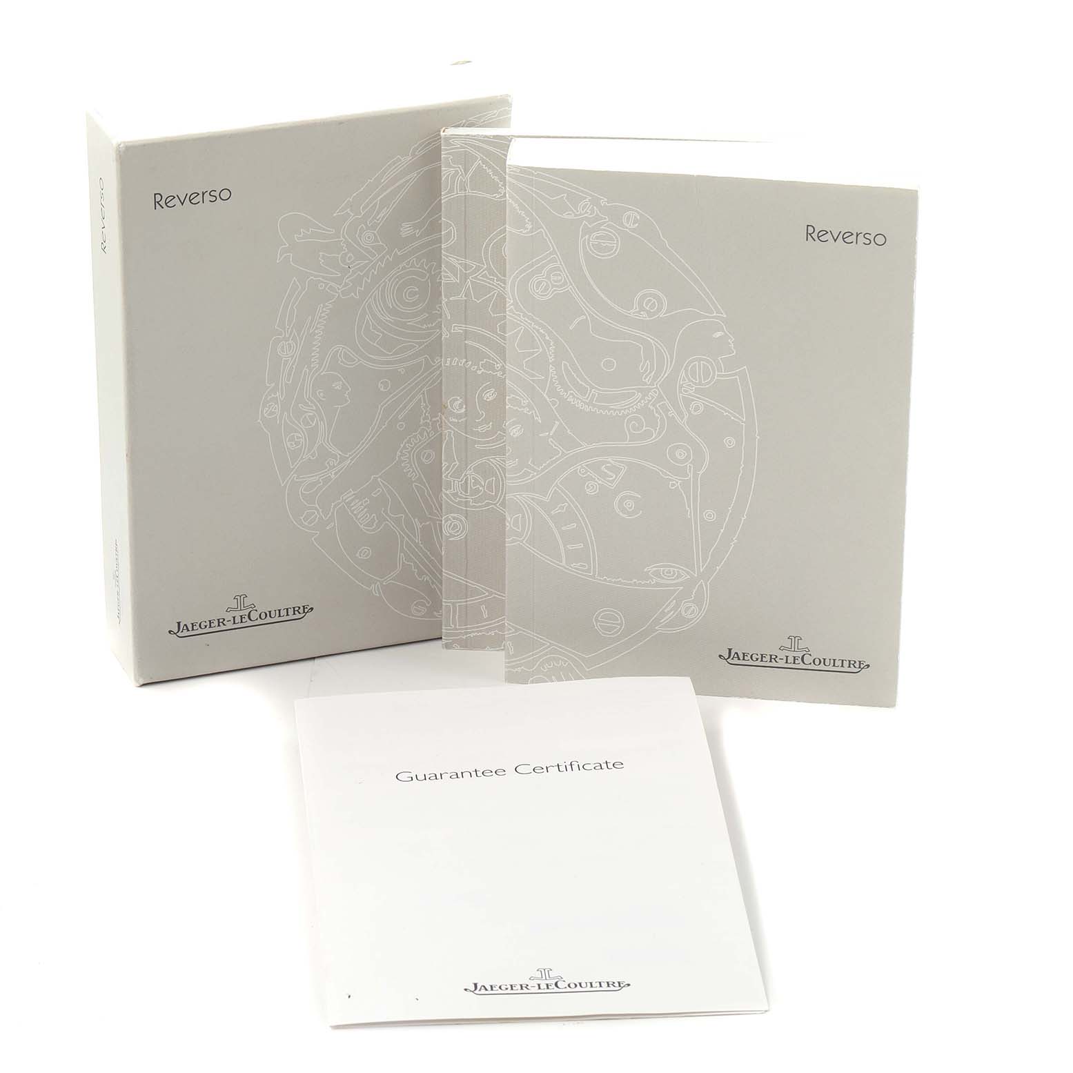 The image shows the box, manual, and guarantee certificate for the Jaeger-LeCoultre Reverso.
