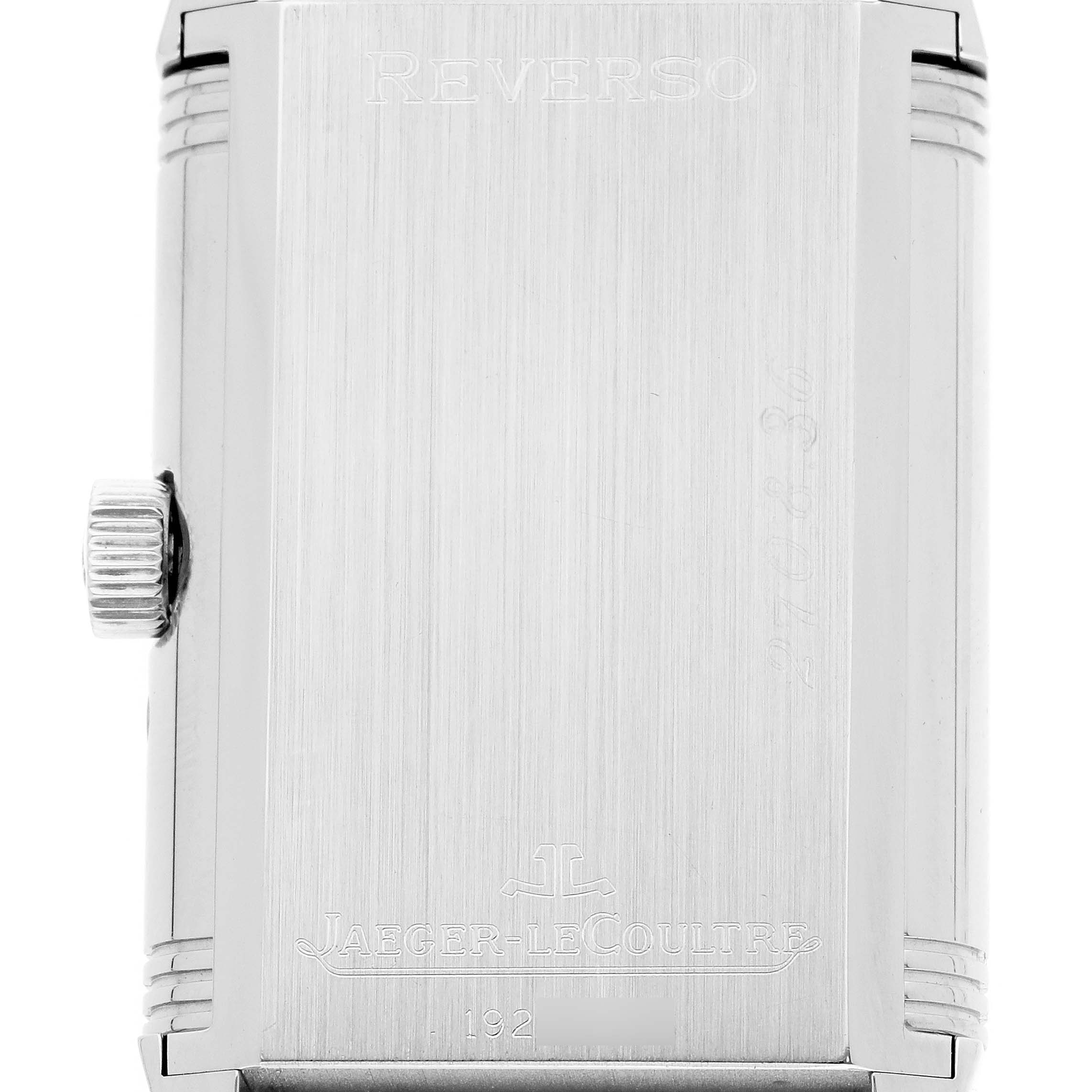 The image shows the back of the Jaeger-LeCoultre Reverso watch with the crown visible on the left side.