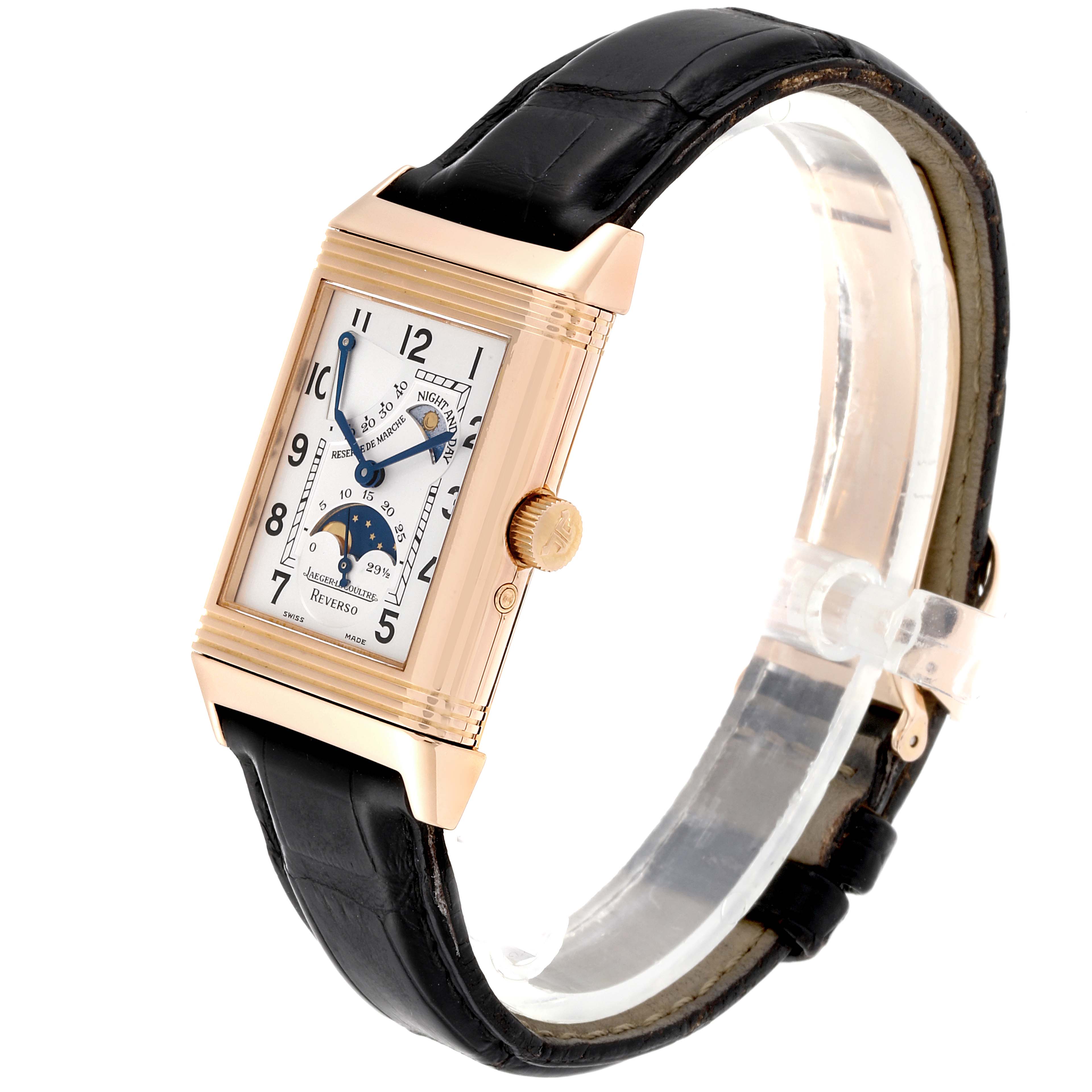 The image shows a Jaeger LeCoultre Reverso Q3042420 Men
s Rose Gold Silver Dial Q3042420 Men
s Rose Gold Silver Dial watch at a three-quarter angle, displaying its face, crown, and strap.