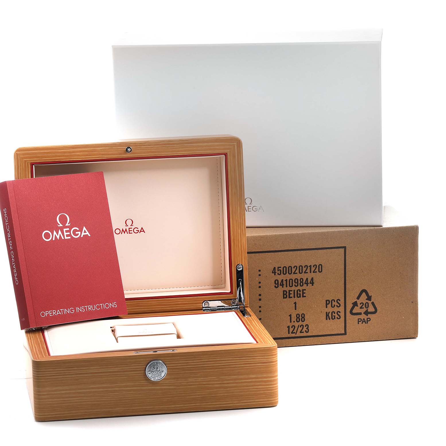 The image shows the Omega De Ville 83149 Men's Rose Gold Blue Dial watch's wooden box, packaging, and operating instructions from a front angle.