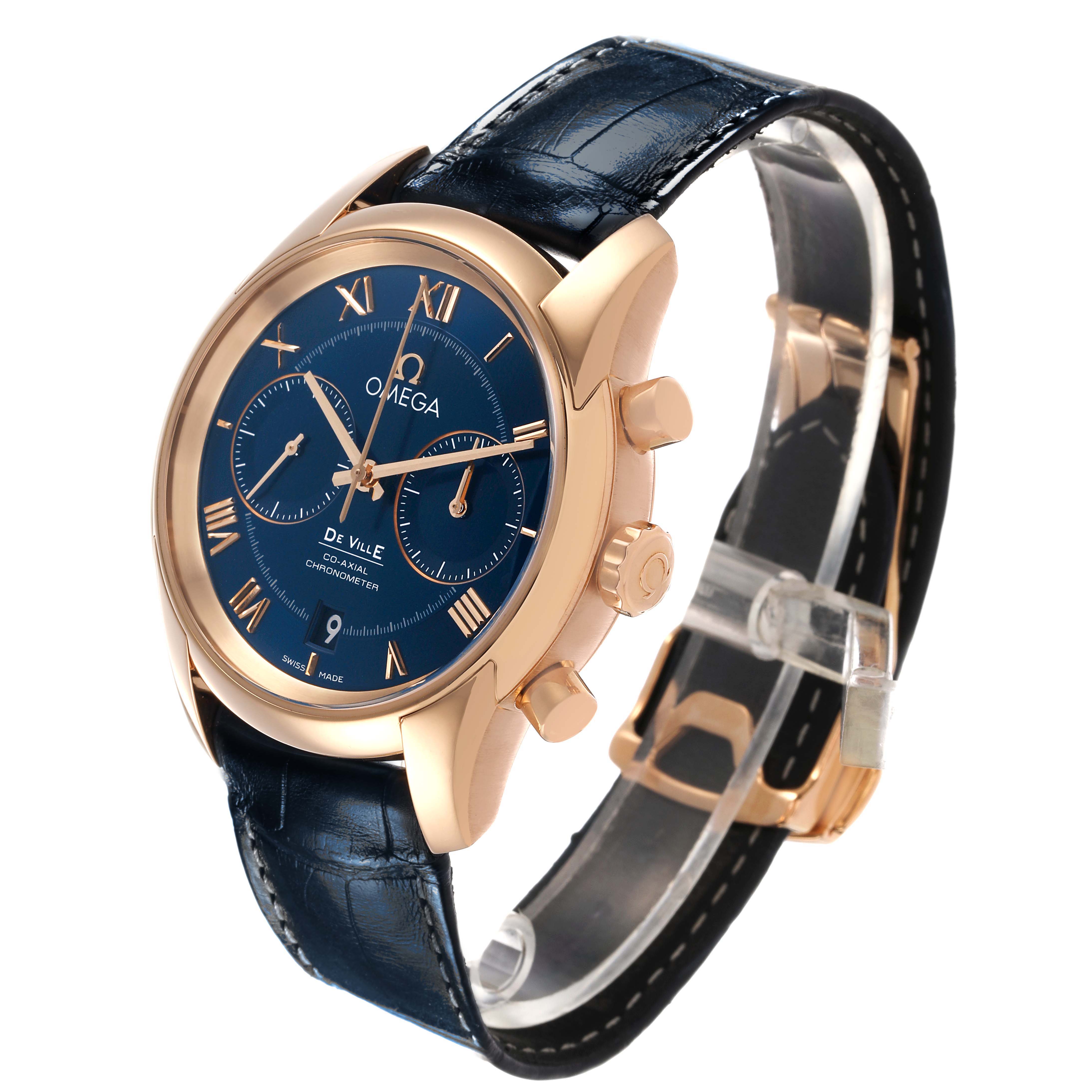The Omega De Ville 83149 Men's Rose Gold Blue Dial watch is shown at a three-quarter angle, highlighting the blue dial, gold casing, and leather strap.