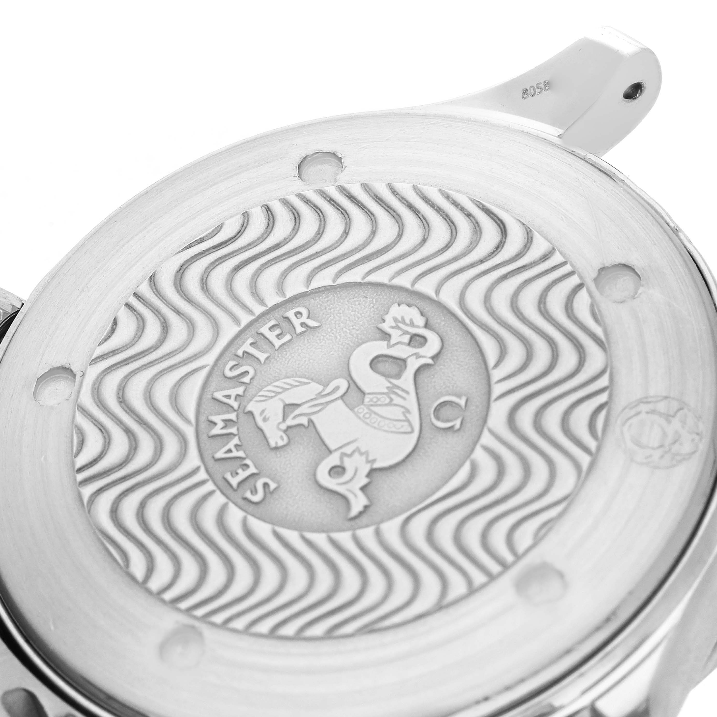 The image shows the back of the Omega Seamaster 2531.80.00 Men
s Stainless Steel Blue Dial watch, featuring its embossed logo and wavy pattern.