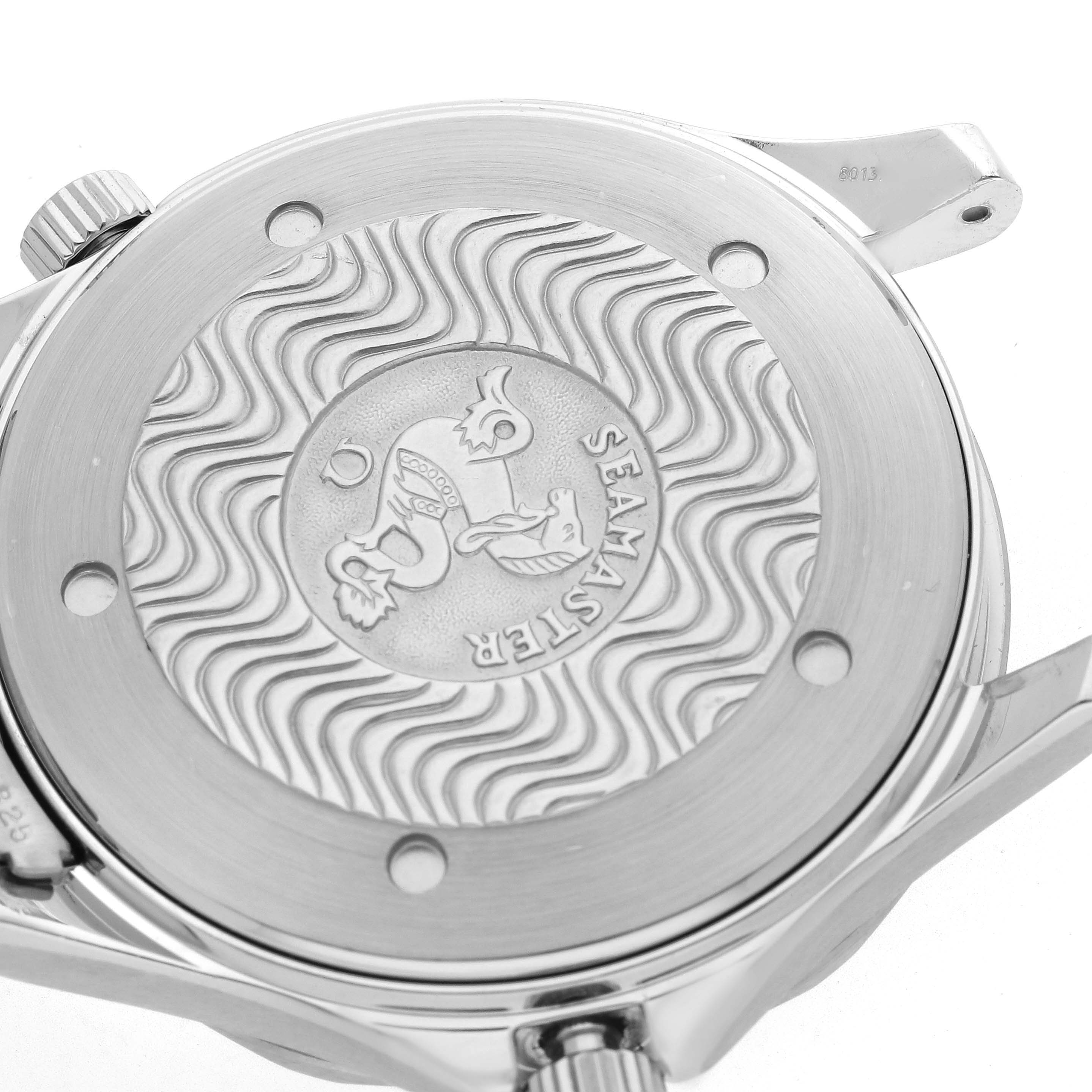 The Omega Seamaster 2531.80.00 Men
s Stainless Steel Blue Dial watch is shown from the back, highlighting the engraved case back with wavy patterns and logo.