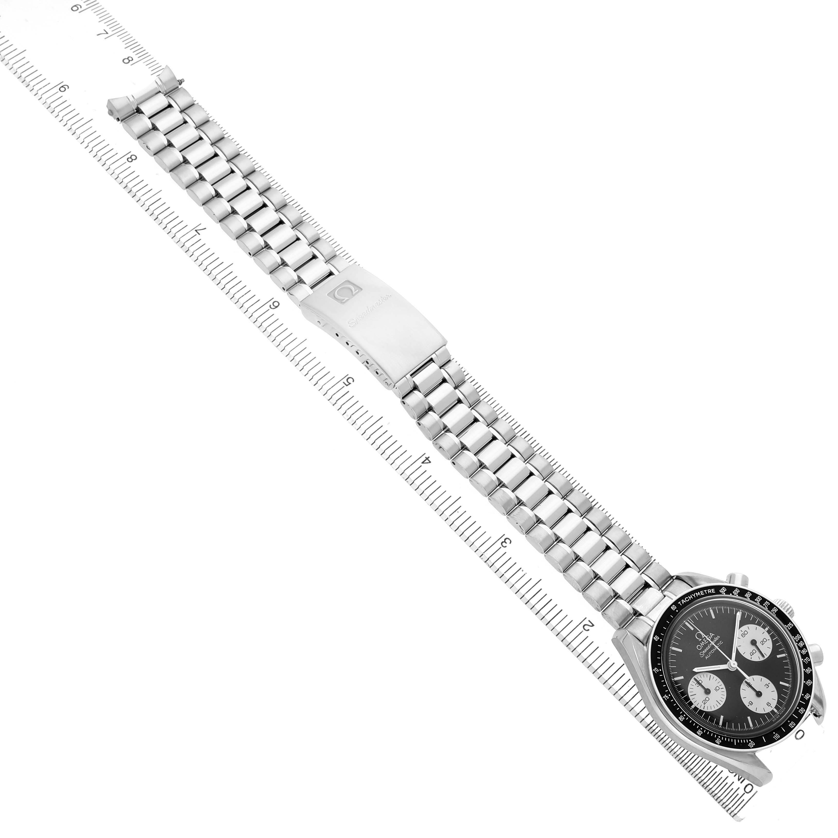 The Omega Speedmaster 3510.52.00 Men's Stainless Steel Black Dial watch is shown from an overhead angle, displaying its stainless steel bracelet and clasp with the face visible.