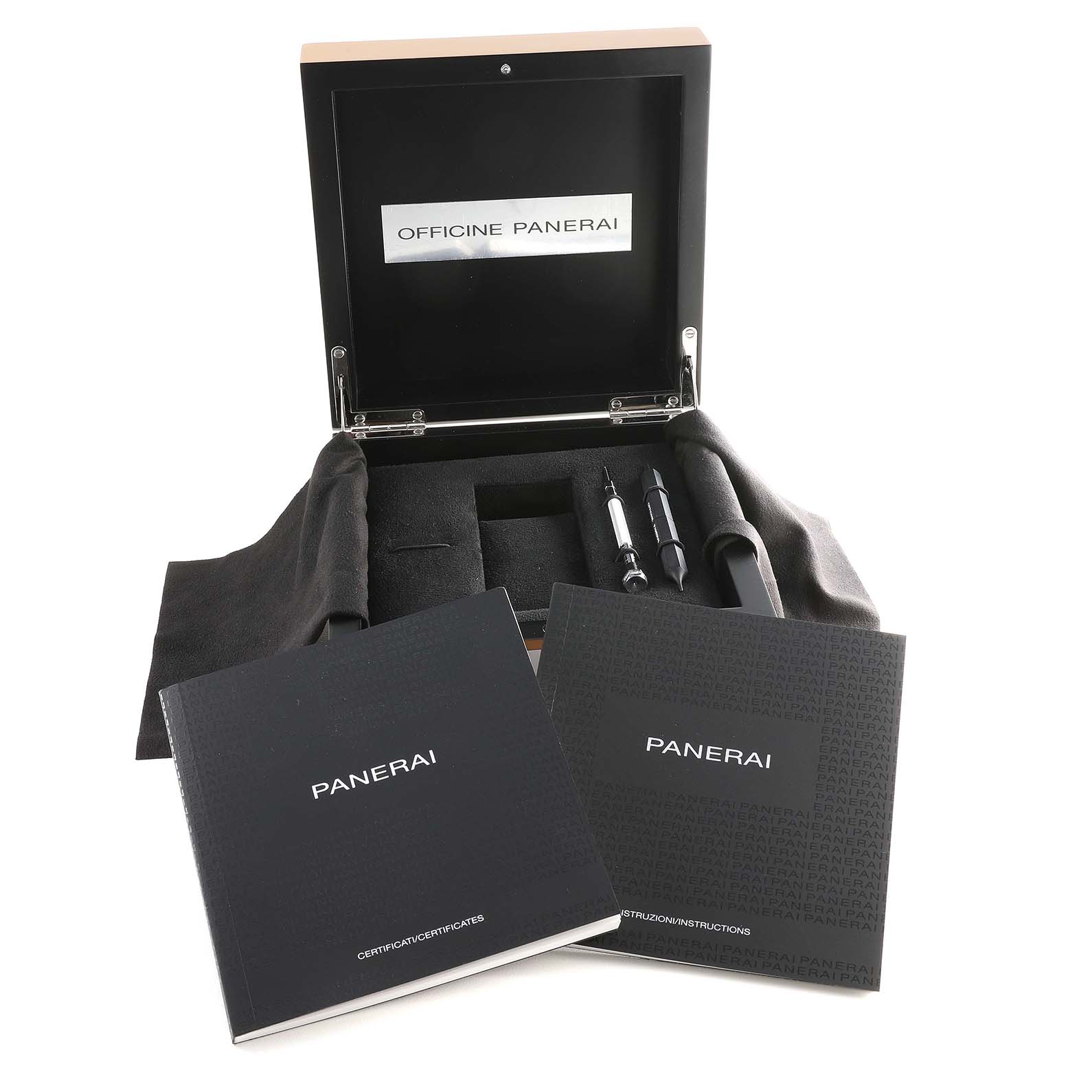 The image shows an open box for a Panerai Luminor PAM01359 Men's Stainless Steel Black Dial PAM01359 Men's Stainless Steel Black Dial watch along with two booklets and watch tools.