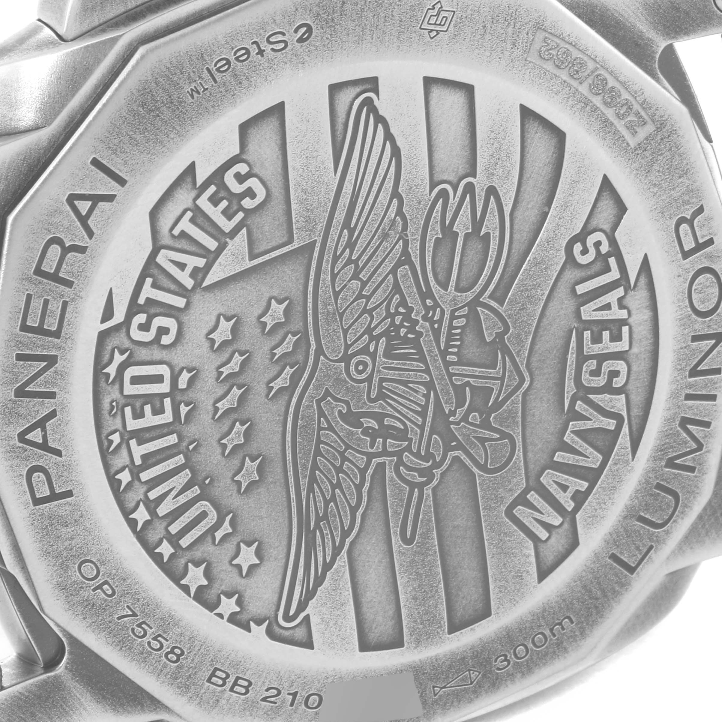 This image shows a close-up of the engraved case back of a Panerai Luminor PAM01412 Men's Stainless Steel Grey Dial PAM01412 Men's Stainless Steel Grey Dial watch, featuring a United States Navy SEALs emblem.