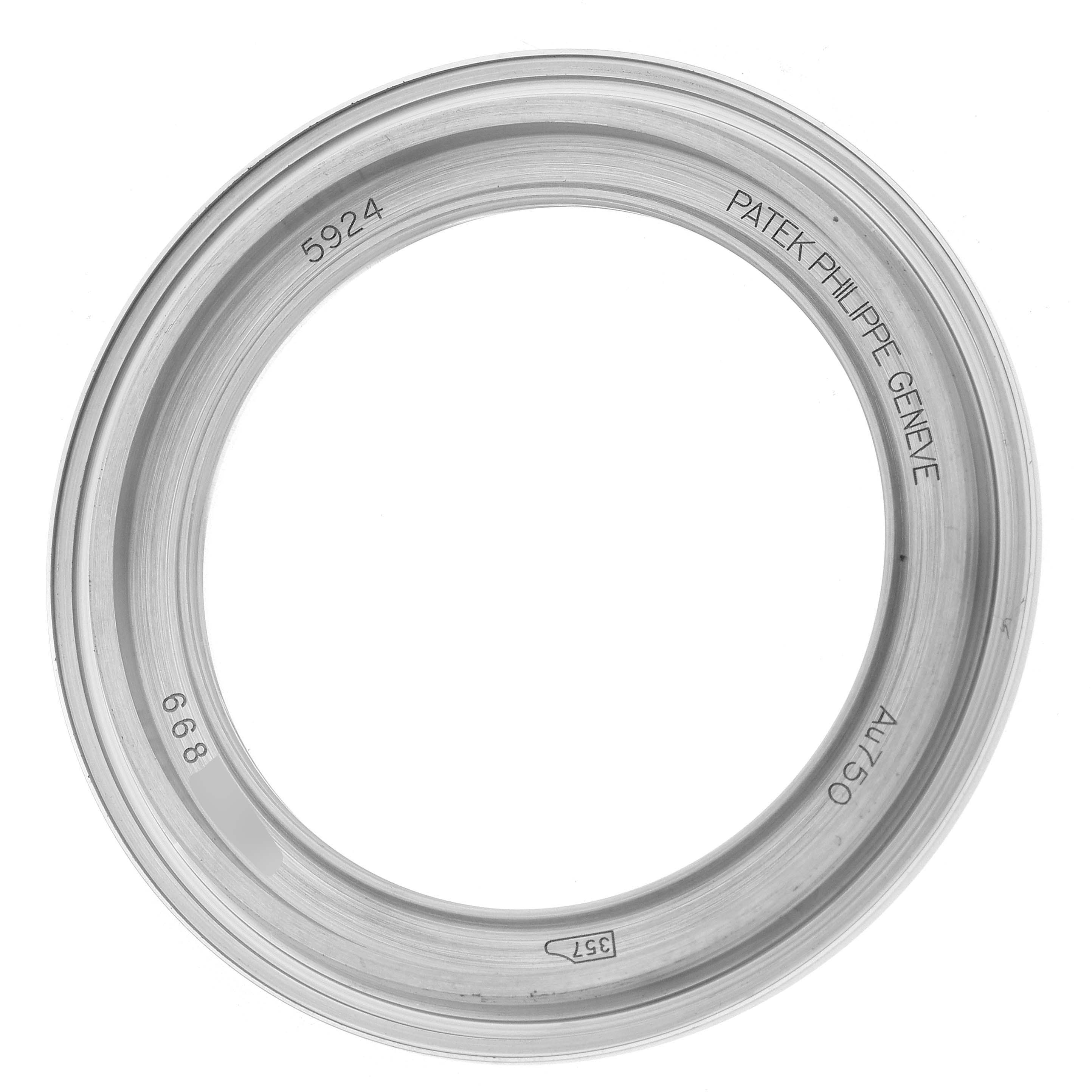 The image shows a top-down view of a case back for a Patek Philippe Calatrava 5924G-001 Men
s White Gold Blue Dial model.