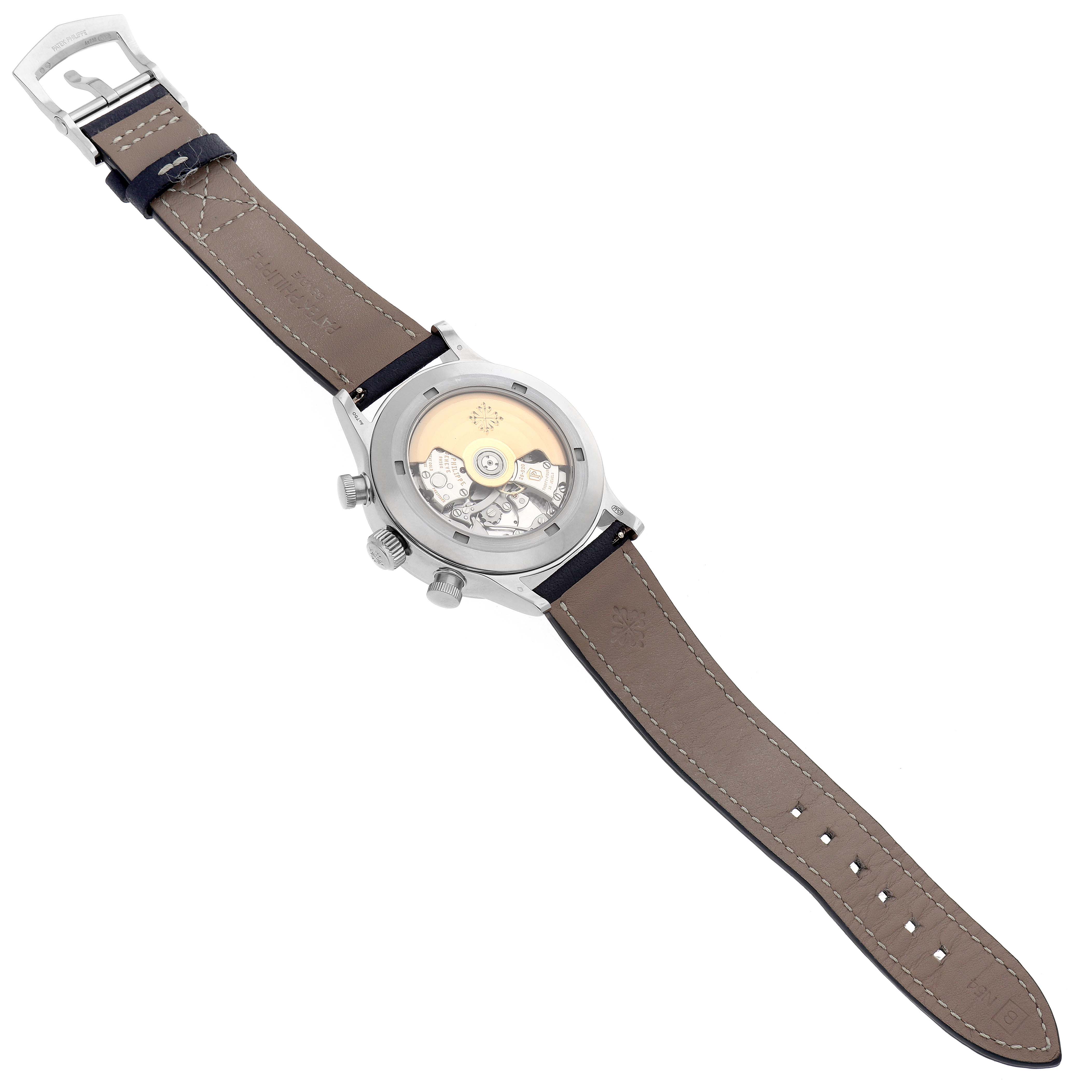 The image shows the backside of a Patek Philippe Calatrava 5924G-001 Men
s White Gold Blue Dial watch, highlighting the movement and inner mechanisms.