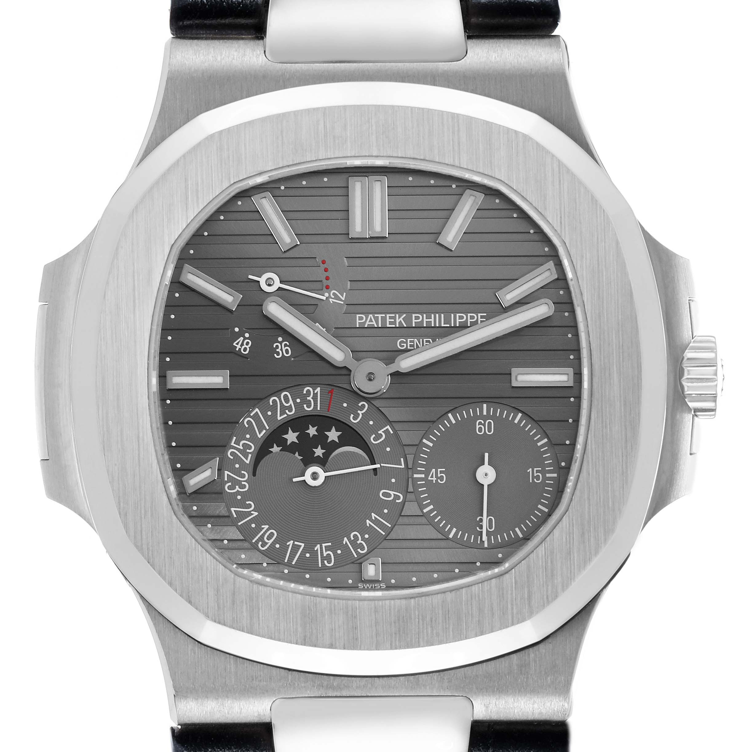 The image shows a front view of the Patek Philippe Nautilus 5712G Men's White Gold Grey Dial, highlighting the dial features and subdials.