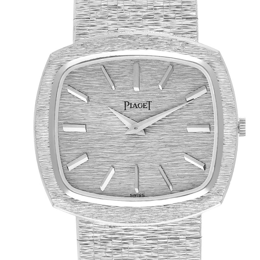 The Piaget 9431A6 men's watch is shown from a front angle, displaying its textured dial, indices, hands, and part of the strap.