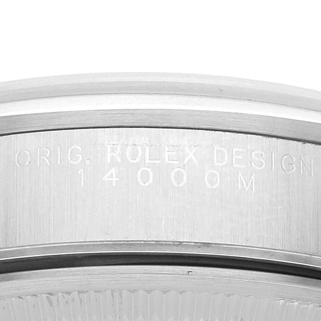 The image shows a close-up of the side of a Rolex Air-King 14000 Men's Stainless Steel Silver Dial 14000 Men's Stainless Steel Silver Dial model, highlighting the engraved text "ORIG. ROLEX DESIGN 14000 M".