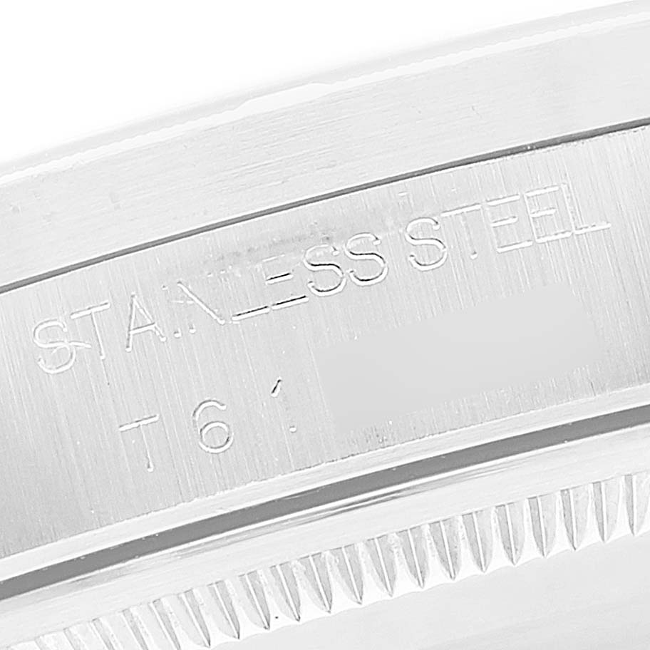 The image shows a close-up of the stainless steel case back engraving of the Rolex Air-King 14010 Men's Stainless Steel White Dial 14010 Men's Stainless Steel White Dial watch.
