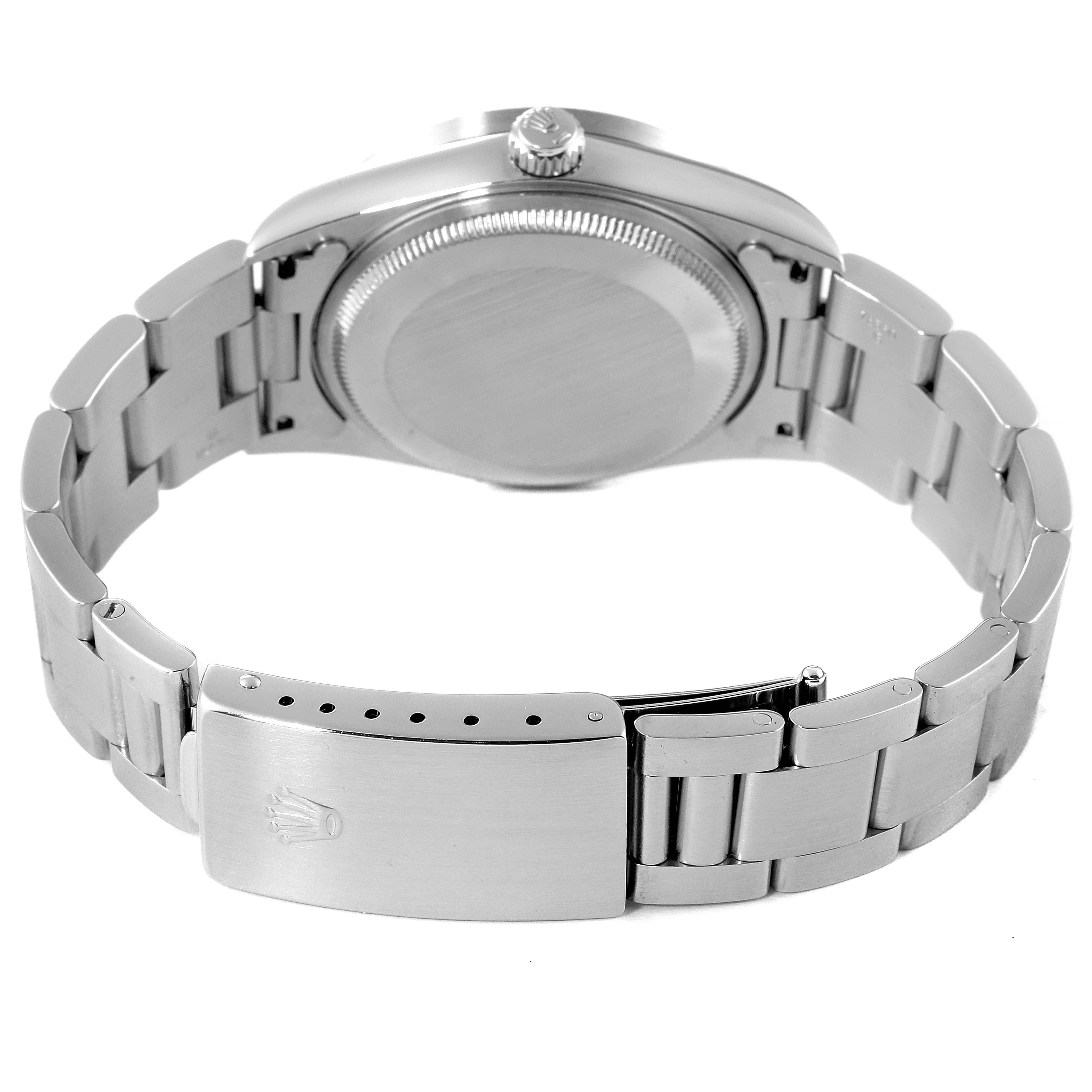 This image shows the back case, crown, and bracelet clasp of a Rolex Air-King 14010 Men's Stainless Steel White Dial 14010 Men's Stainless Steel White Dial watch from a rear angle.