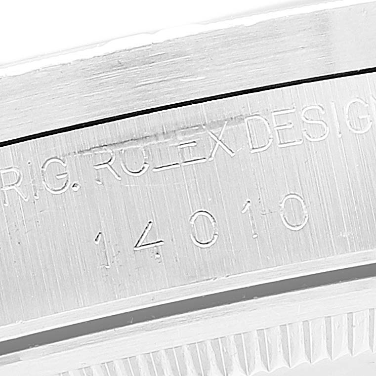 This image shows a close-up of the model number engravings on the side of a Rolex Air-King 14010 Men's Stainless Steel White Dial 14010 Men's Stainless Steel White Dial watch case.
