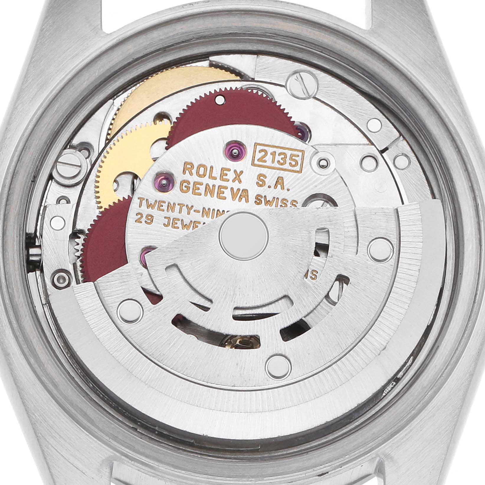 The image shows the movement components of a Rolex Date 69190 Women
s Stainless Steel Silver Dial model from the back, highlighting gears and engravings.