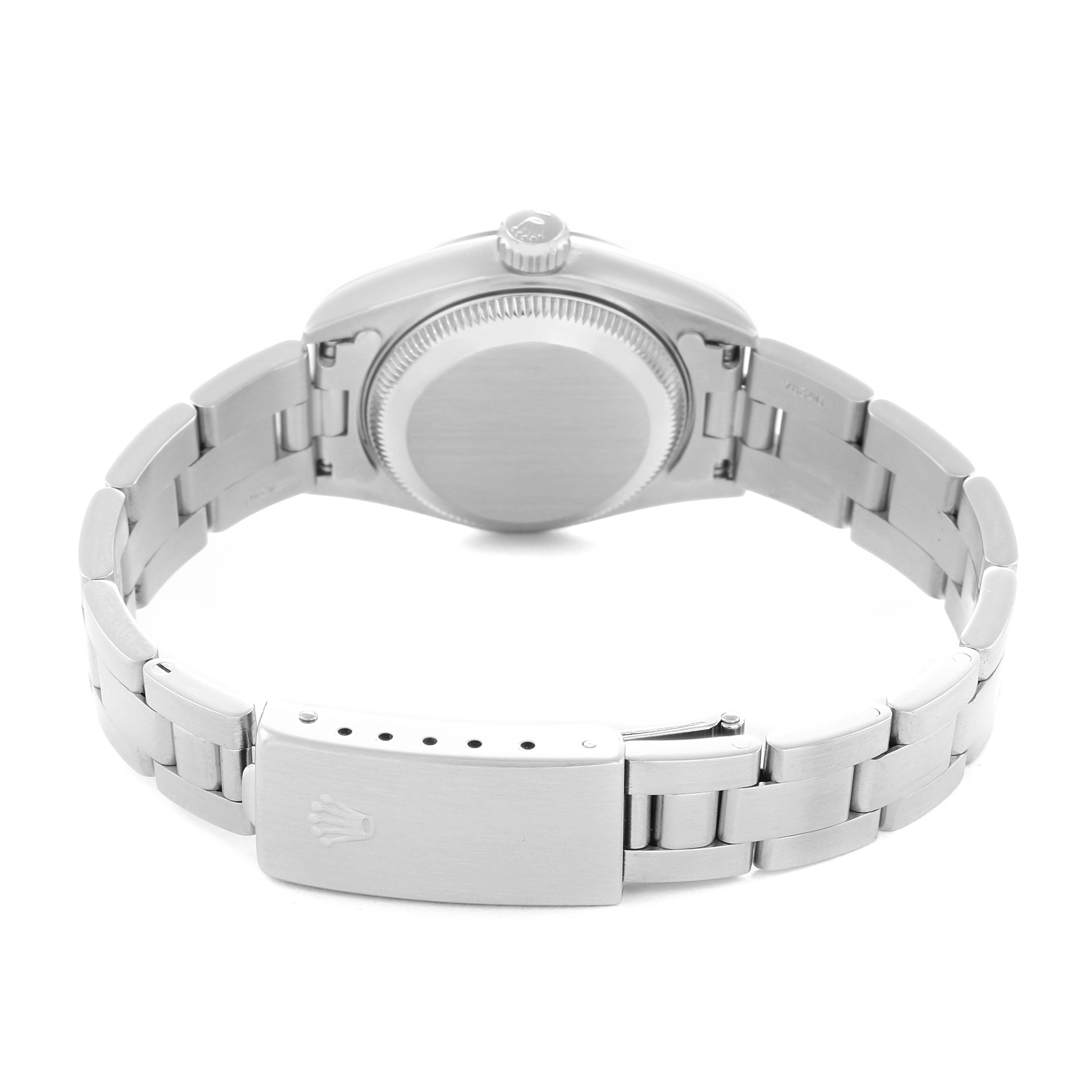 The image shows the back case, crown, and bracelet clasp of a Rolex Date 69190 Women
s Stainless Steel Silver Dial watch from a rear angle.