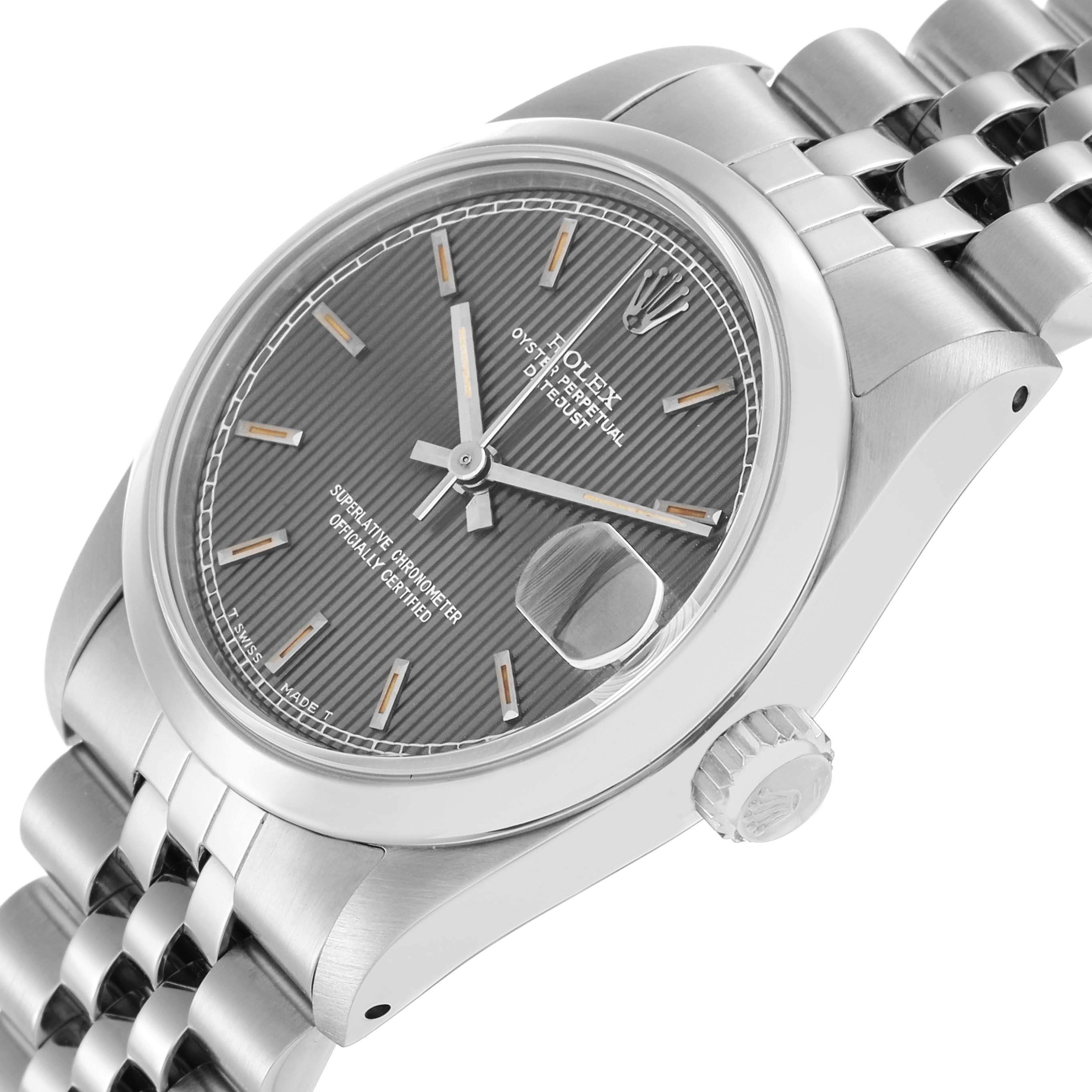 The Rolex Datejust 68240 Women
s Stainless Steel Silver Dial watch is shown at an angle highlighting its dial, crown, bezel, and Jubilee bracelet.