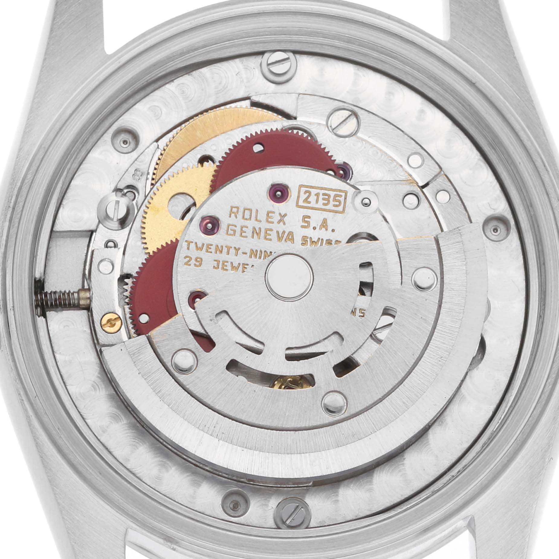 The image shows the movement mechanism of a Rolex Datejust 68240 Women
s Stainless Steel Silver Dial watch from a top-down angle, highlighting the intricate gears and components.