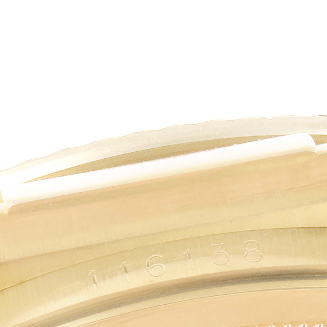 The image shows a close-up of the engraved model number "116138" on the side of a Rolex Datejust 116138 Men's Yellow Gold Champagne Dial 116138 Men's Yellow Gold Champagne Dial watch case.