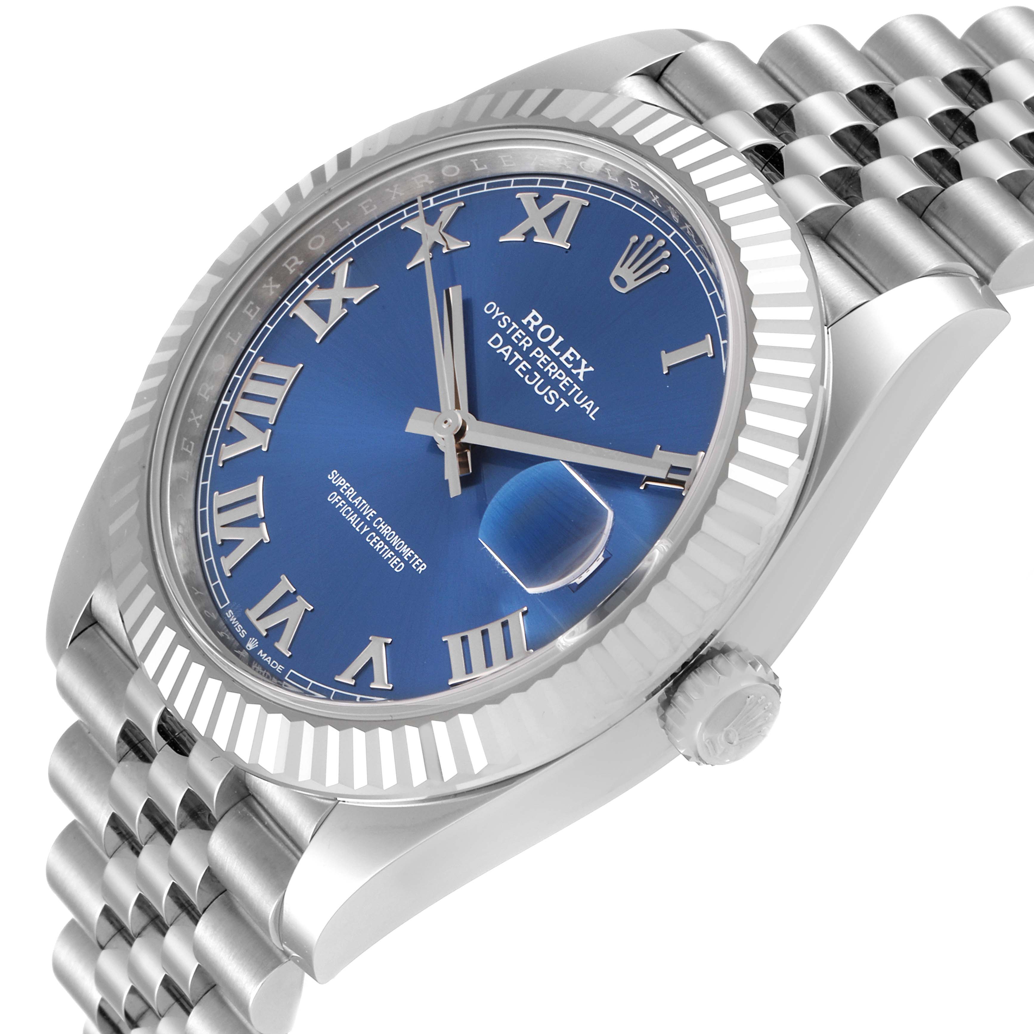 The image shows a Rolex Datejust 41 126334 Men's Stainless Steel Blue Dial 126334 Men's Stainless Steel Blue Dial watch at an angled close-up, displaying its blue dial, fluted bezel, and Jubilee bracelet.
